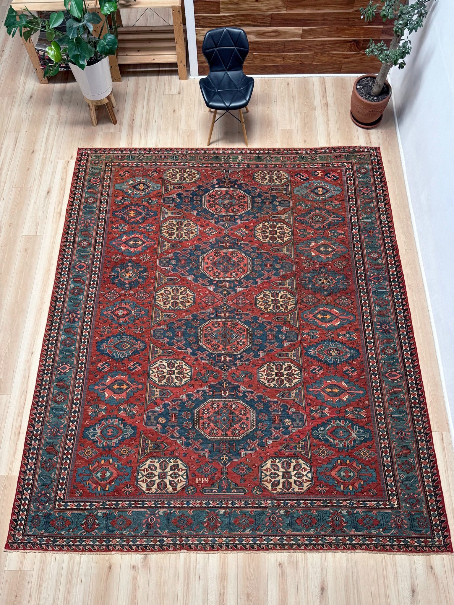Antique Caucasian Soumak rug with madder red and indigo blue geometric medallions, woven in the South Caucasus circa 1925, available at top-rated rug shop in San Mateo, SF Bay Area with free shipping.