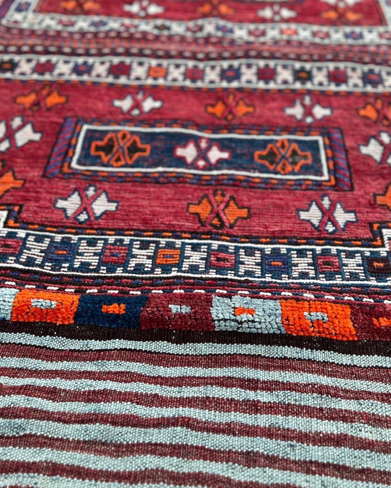 Vintage Bakhtiari Khorjin saddle bag rug 3x8 — 1940s Persian tribal runner handwoven with flatweave, pile, and soumak techniques in crimson red, indigo blue, and ivory — antique wool rug from Northwest Persia, Indigo Rugs Burlingame CA