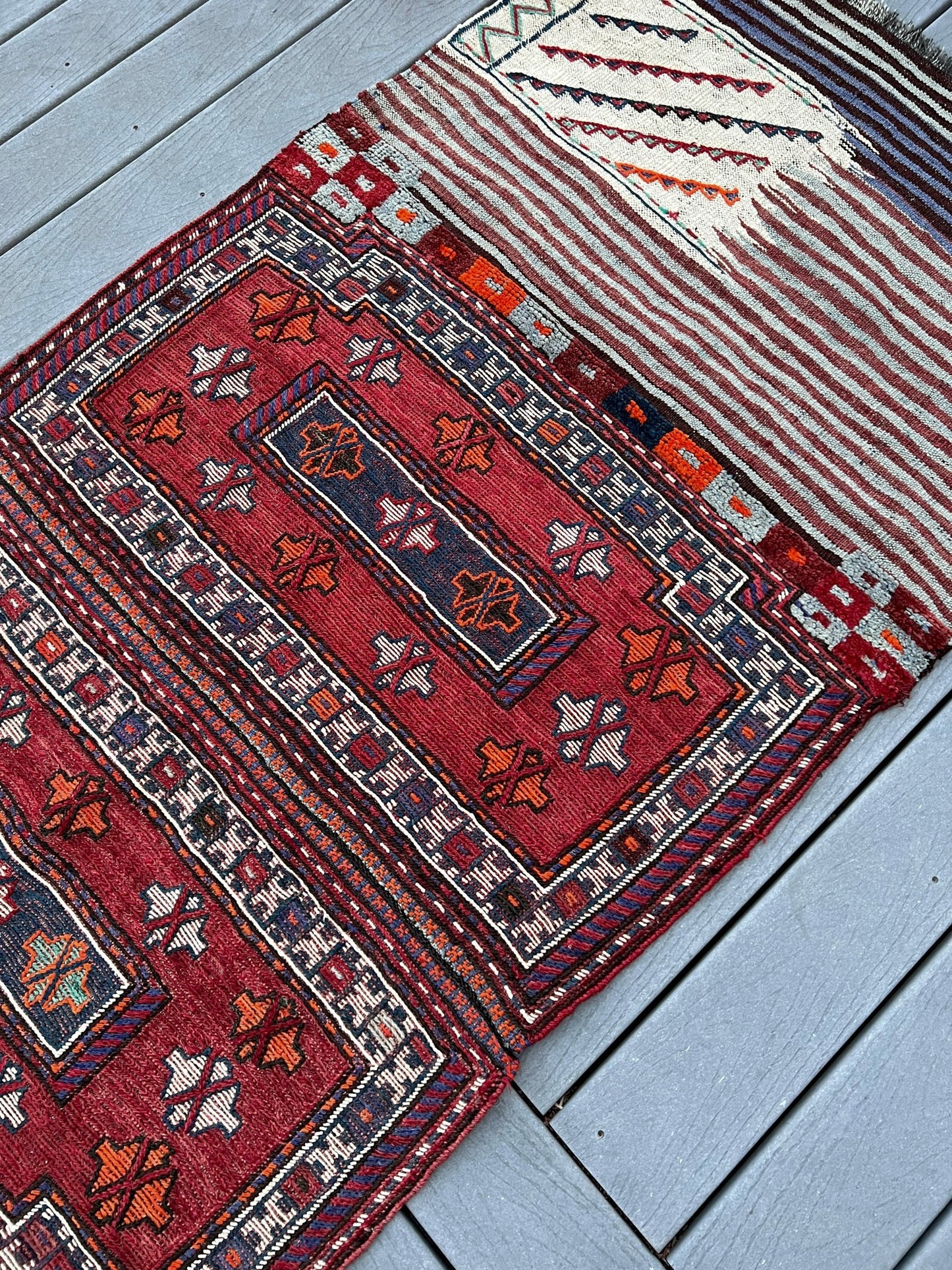 Vintage Bakhtiari Khorjin saddle bag rug 3x8 — 1940s Persian tribal runner handwoven with flatweave, pile, and soumak techniques in crimson red, indigo blue, and ivory — antique wool rug from Northwest Persia, Indigo Rugs Burlingame CA