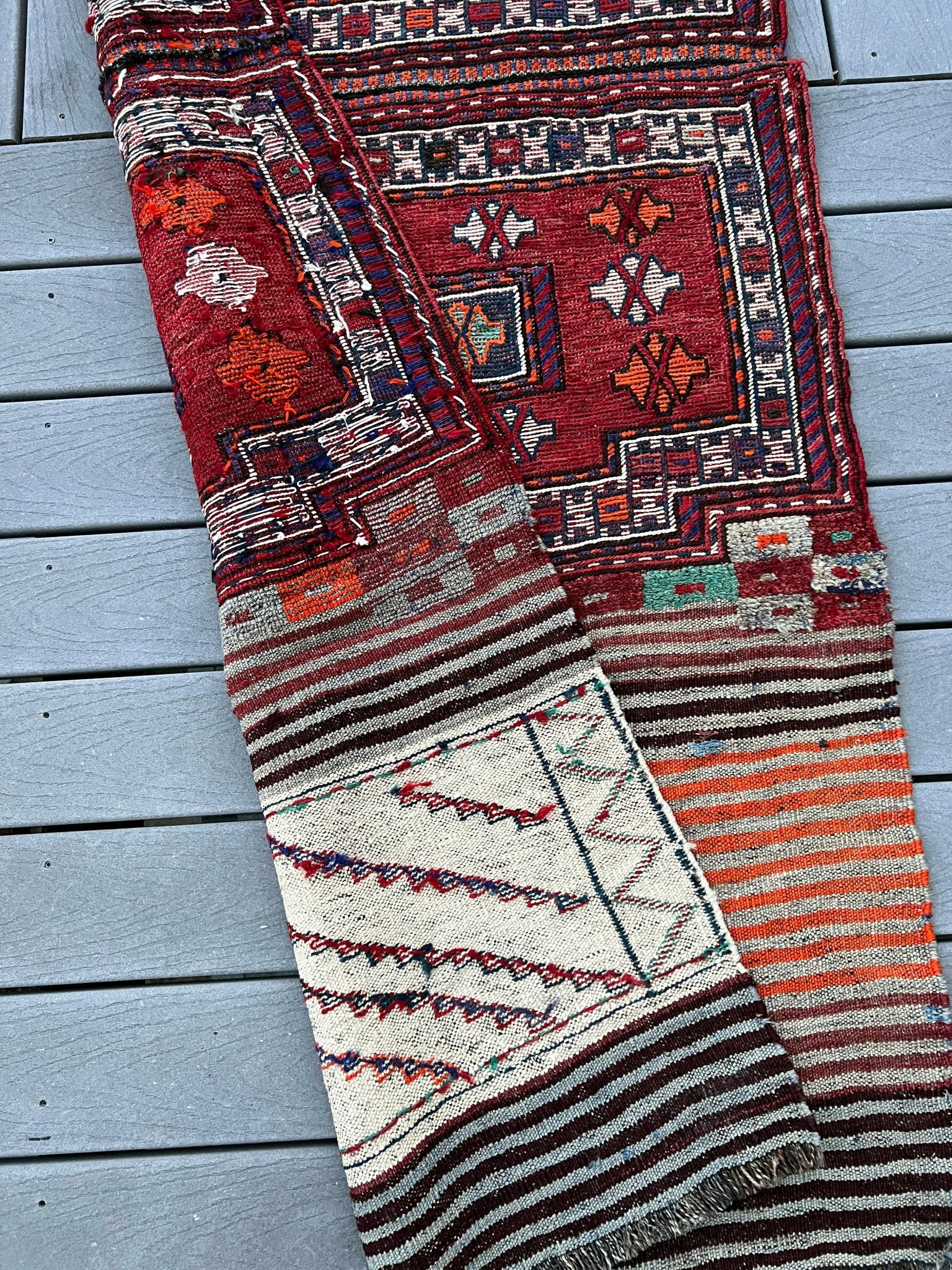 Vintage Bakhtiari Khorjin saddle bag rug 3x8 — 1940s Persian tribal runner handwoven with flatweave, pile, and soumak techniques in crimson red, indigo blue, and ivory — antique wool rug from Northwest Persia, Indigo Rugs Burlingame CA