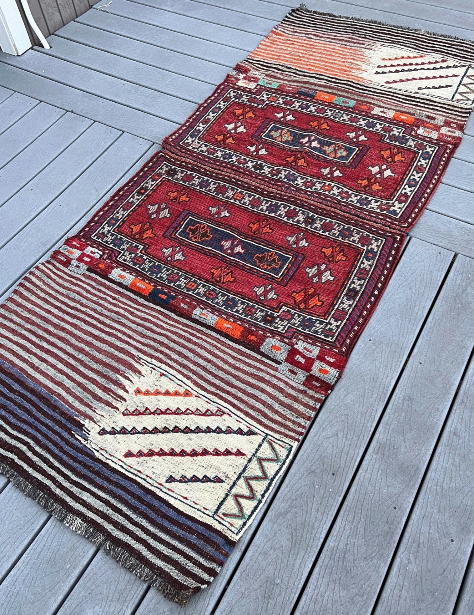 Vintage Bakhtiari Khorjin saddle bag rug 3x8 — 1940s Persian tribal runner handwoven with flatweave, pile, and soumak techniques in crimson red, indigo blue, and ivory — antique wool rug from Northwest Persia, Indigo Rugs Burlingame CA