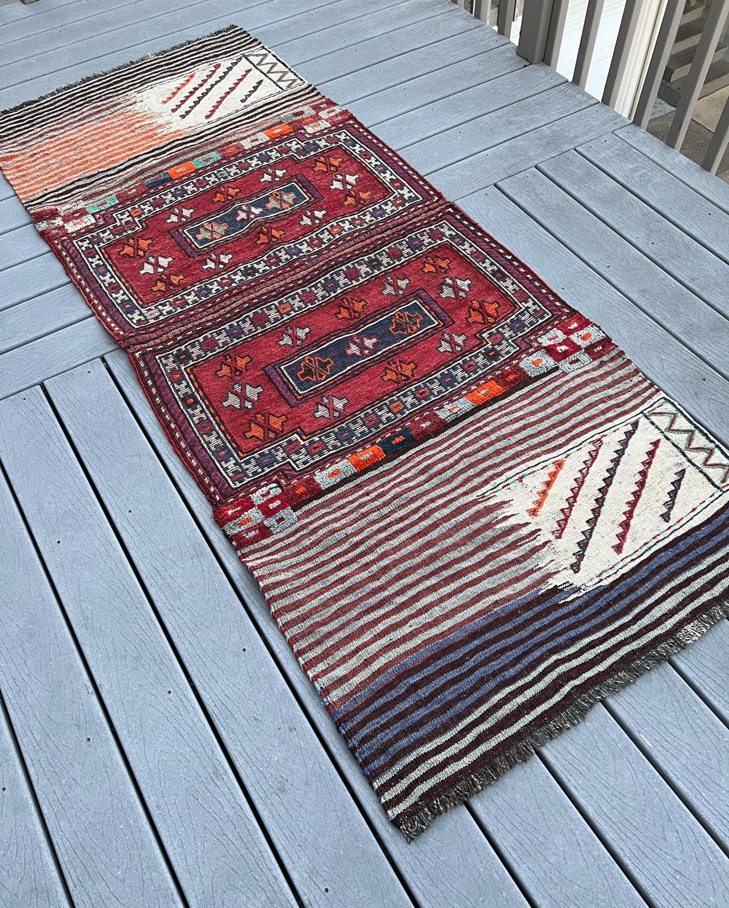 Vintage Bakhtiari Khorjin saddle bag rug 3x8 — 1940s Persian tribal runner handwoven with flatweave, pile, and soumak techniques in crimson red, indigo blue, and ivory — antique wool rug from Northwest Persia, Indigo Rugs Burlingame CA