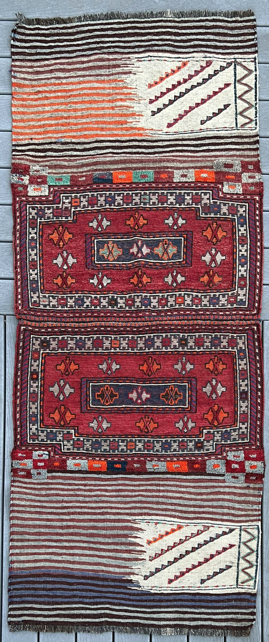 Vintage Bakhtiari Khorjin saddle bag rug 3x8 — 1940s Persian tribal runner handwoven with flatweave, pile, and soumak techniques in crimson red, indigo blue, and ivory — antique wool rug from Northwest Persia, Indigo Rugs Burlingame CA