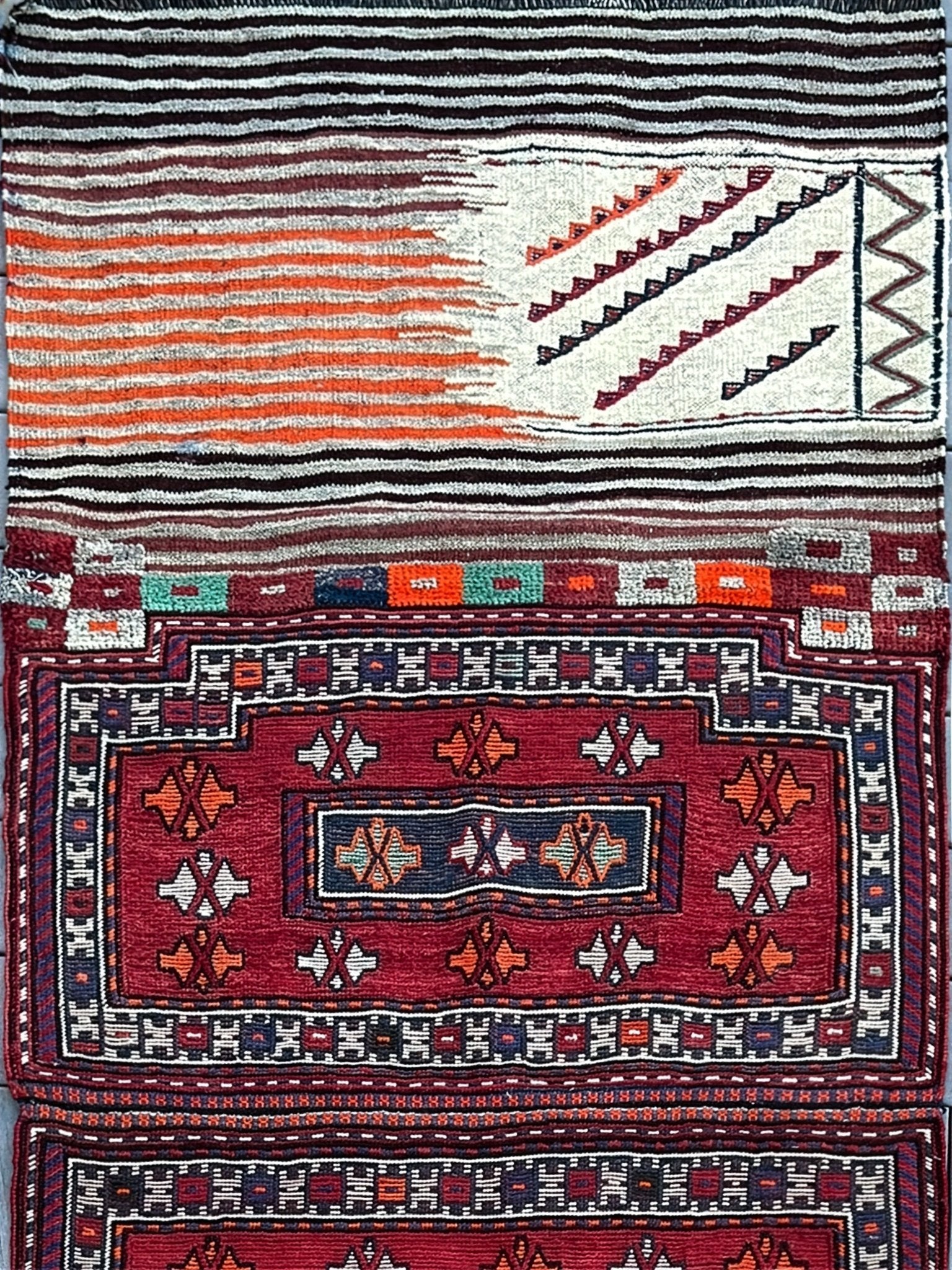 Vintage Bakhtiari Khorjin saddle bag rug 3x8 — 1940s Persian tribal runner handwoven with flatweave, pile, and soumak techniques in crimson red, indigo blue, and ivory — antique wool rug from Northwest Persia, Indigo Rugs Burlingame CA