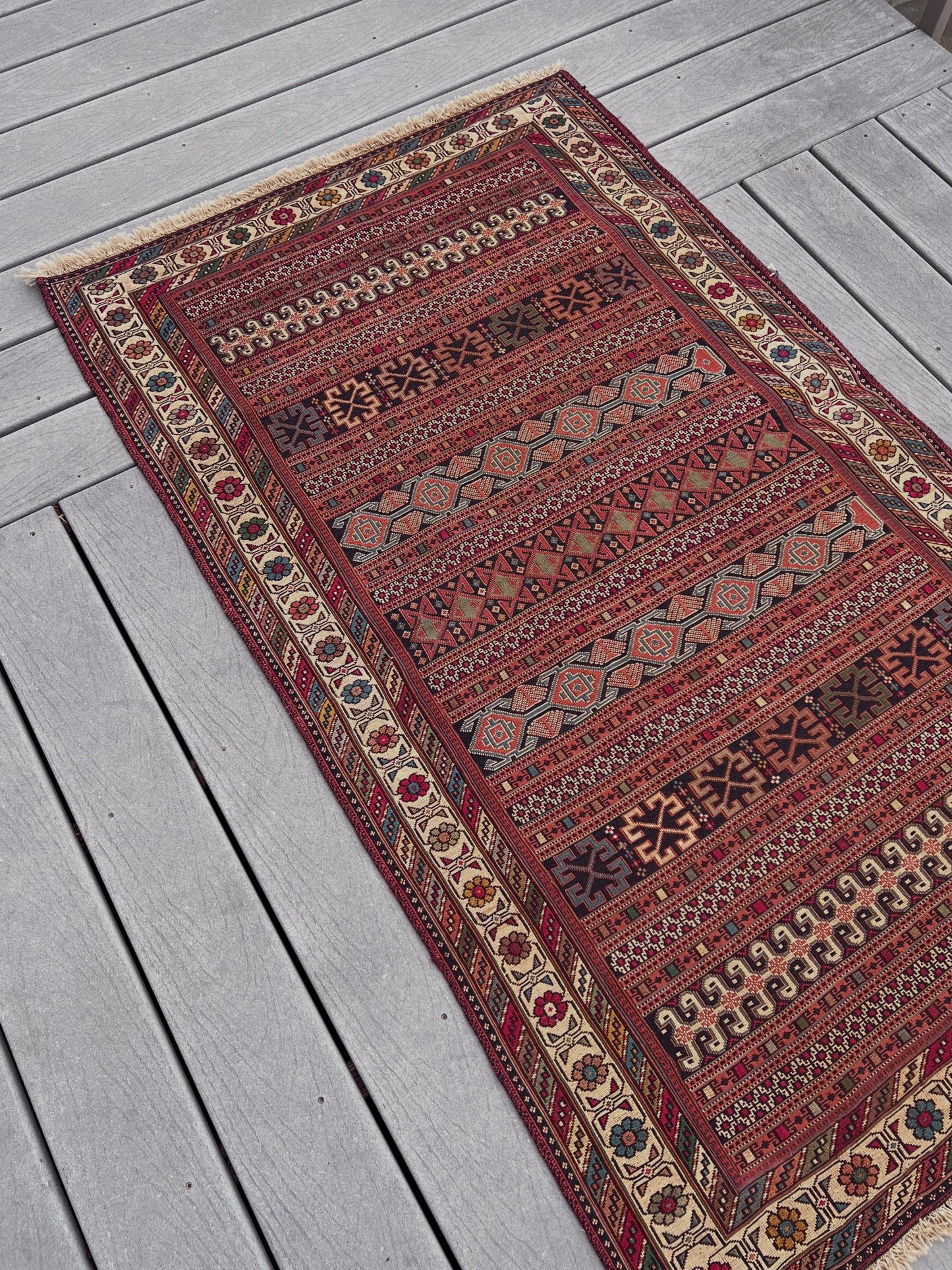 Vintage Rahrah Persian Soumak flatweave rug with terracotta, rust, olive, and ivory geometric bands — handmade wool wall hanging from 1960s Northwest Persia, available at Indigo Rugs, the best rug shop in San Francisco Bay Area, Burlingame CA.