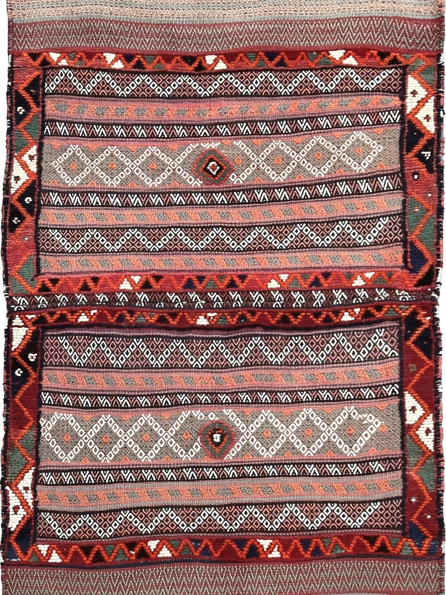 Vintage Bakhtiari khorjin saddle bag wall art rug (3'x6'7") featuring terracotta and ivory diamond motifs, olive and charcoal tribal patterns, and rare triple-weave structure — handmade in NW Persia, circa 1940s