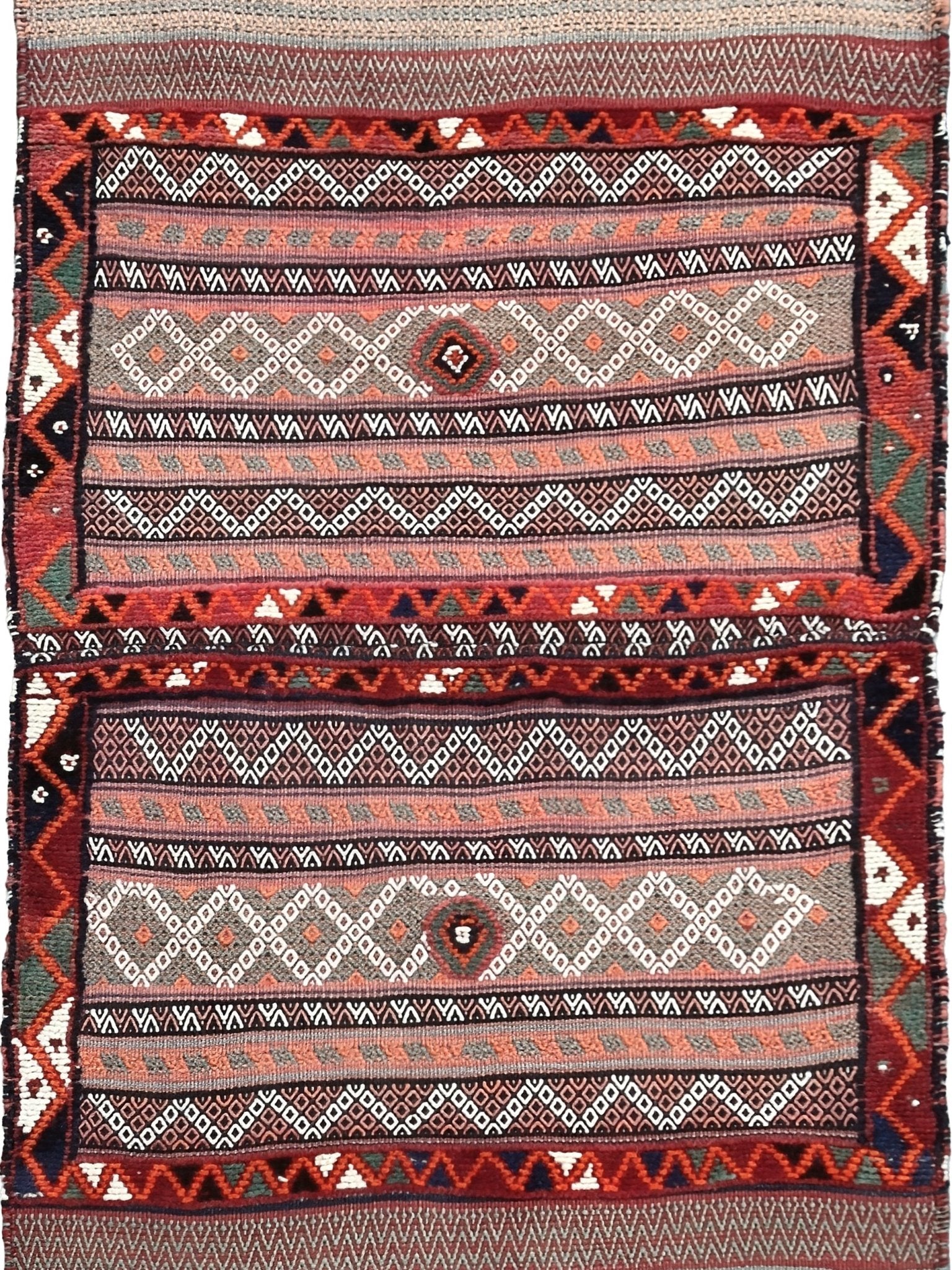 Vintage Bakhtiari khorjin saddle bag wall art rug (3'x6'7") featuring terracotta and ivory diamond motifs, olive and charcoal tribal patterns, and rare triple-weave structure — handmade in NW Persia, circa 1940s