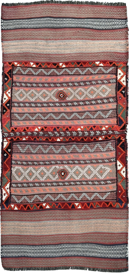 Vintage Bakhtiari khorjin saddle bag wall art rug (3'x6'7") featuring terracotta and ivory diamond motifs, olive and charcoal tribal patterns, and rare triple-weave structure — handmade in NW Persia, circa 1940s