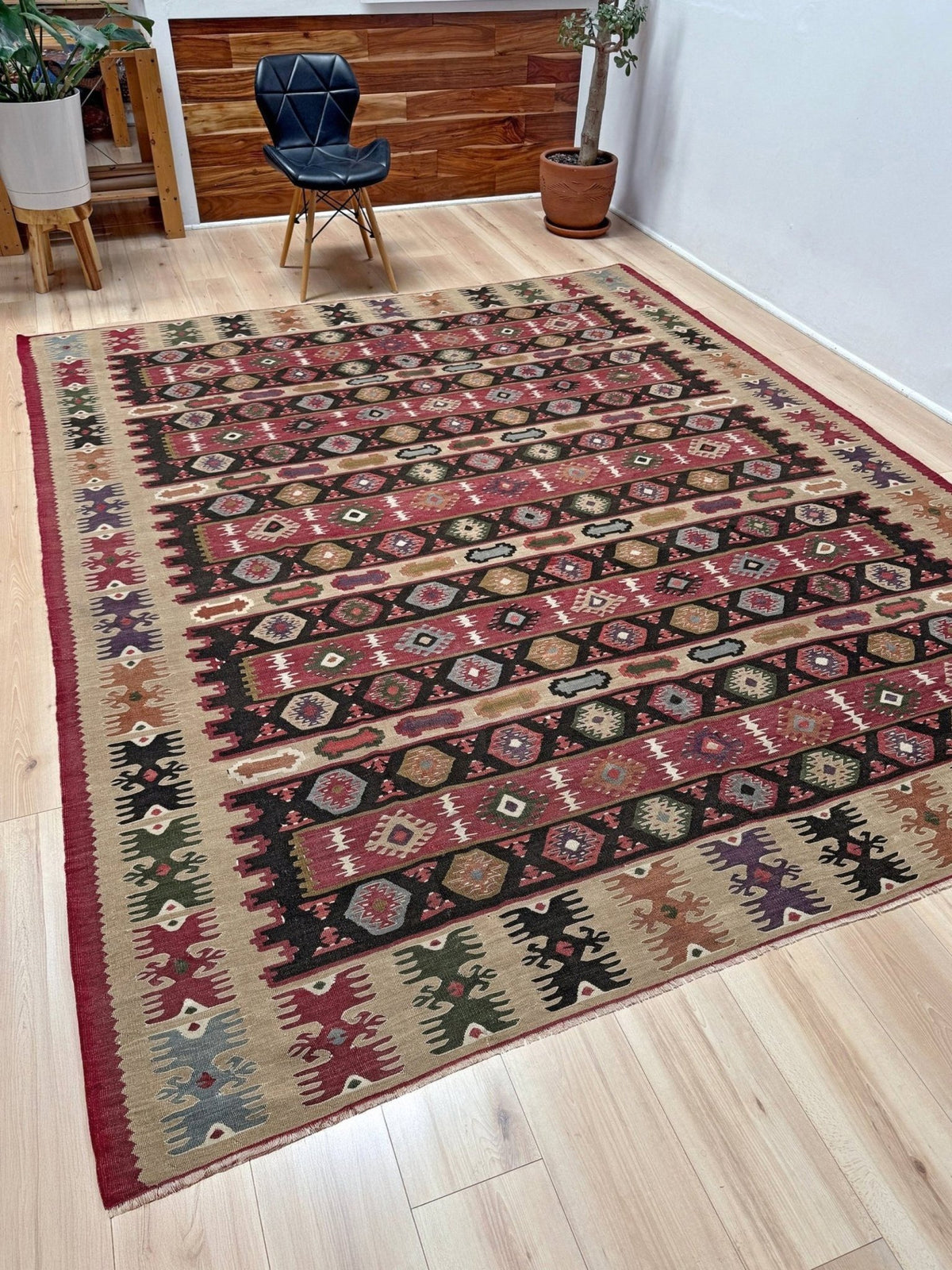 Handmade vintage Pirot Sharkoy kilim rug from the Balkans, square approx. 8x10, with garnet red geometric bands, ivory tribal border, and charcoal, sage, and dusty blue motifs.