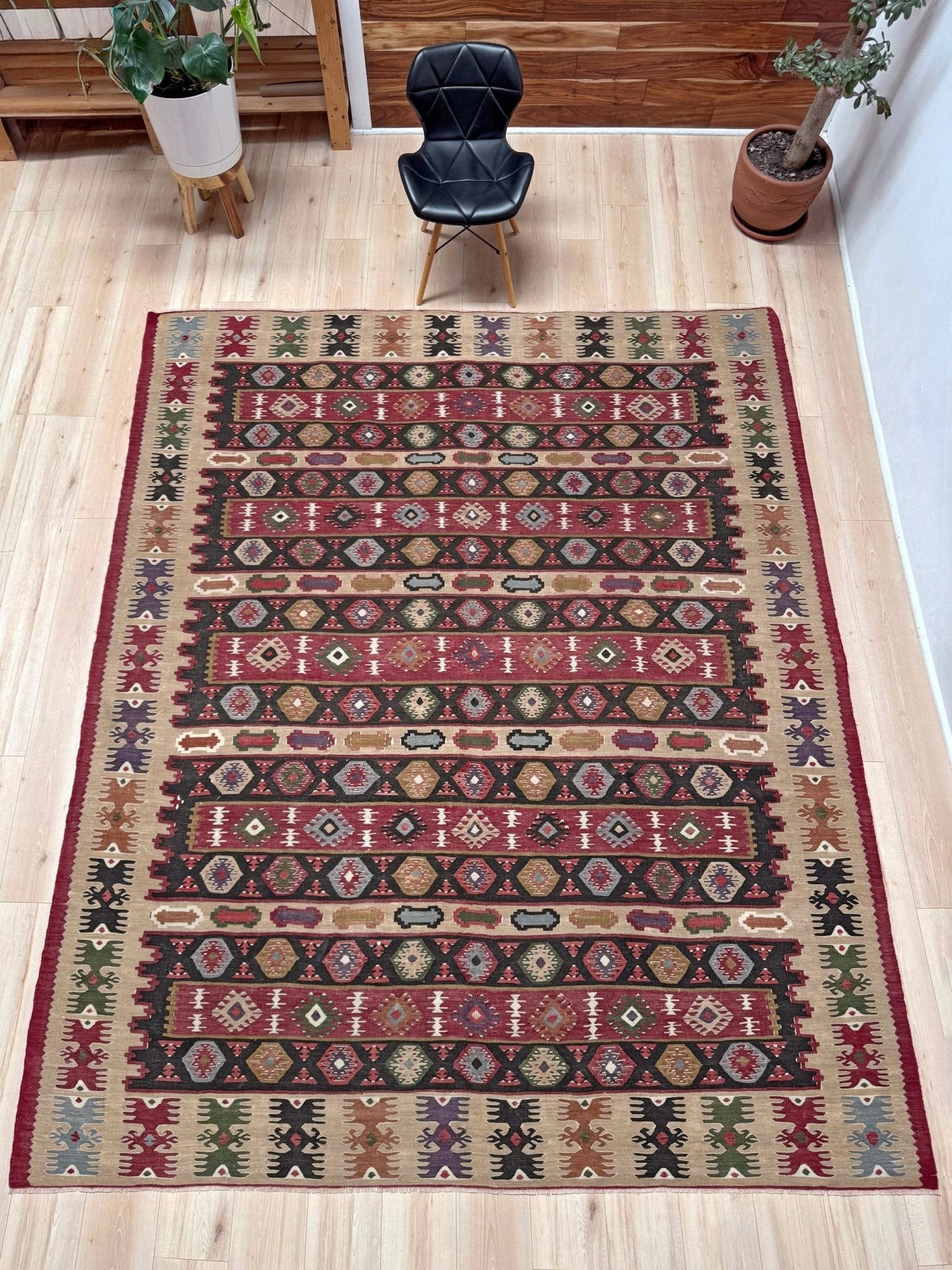 Handmade vintage Pirot Sharkoy kilim rug from the Balkans, approx. 8x10, with garnet red geometric bands, ivory tribal border, and charcoal, sage, and dusty blue motifs.