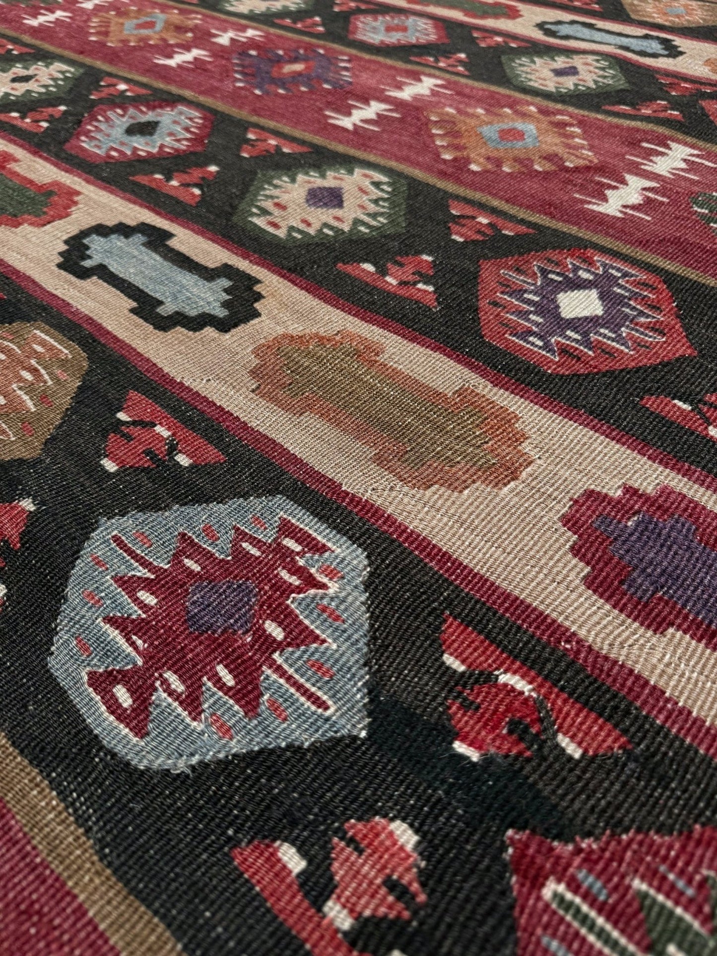 Handmade vintage Pirot Sharkoy kilim rug from the Balkans, approx. 8x10, with garnet red geometric bands, ivory tribal border, and charcoal, sage, and dusty blue motifs.