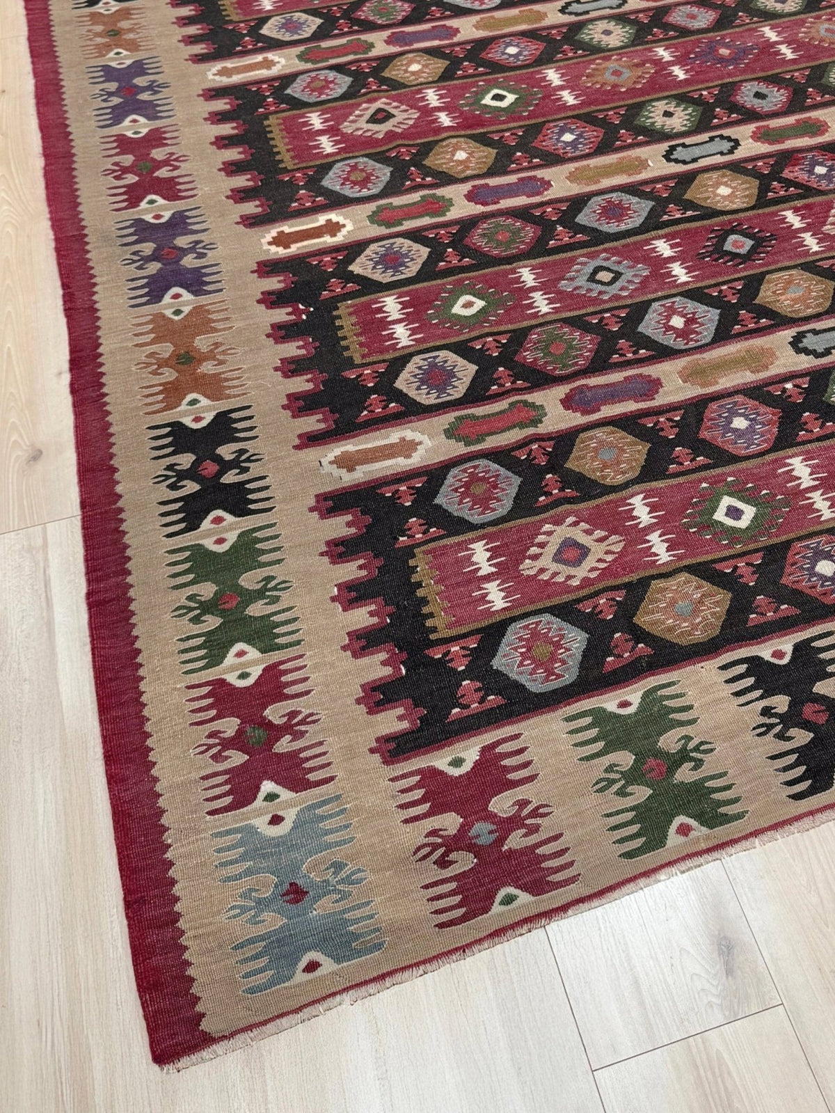 Handmade vintage Pirot Sharkoy kilim rug from the Balkans, square approx. 8x10, with garnet red geometric bands, ivory tribal border, and charcoal, sage, and dusty blue motifs.