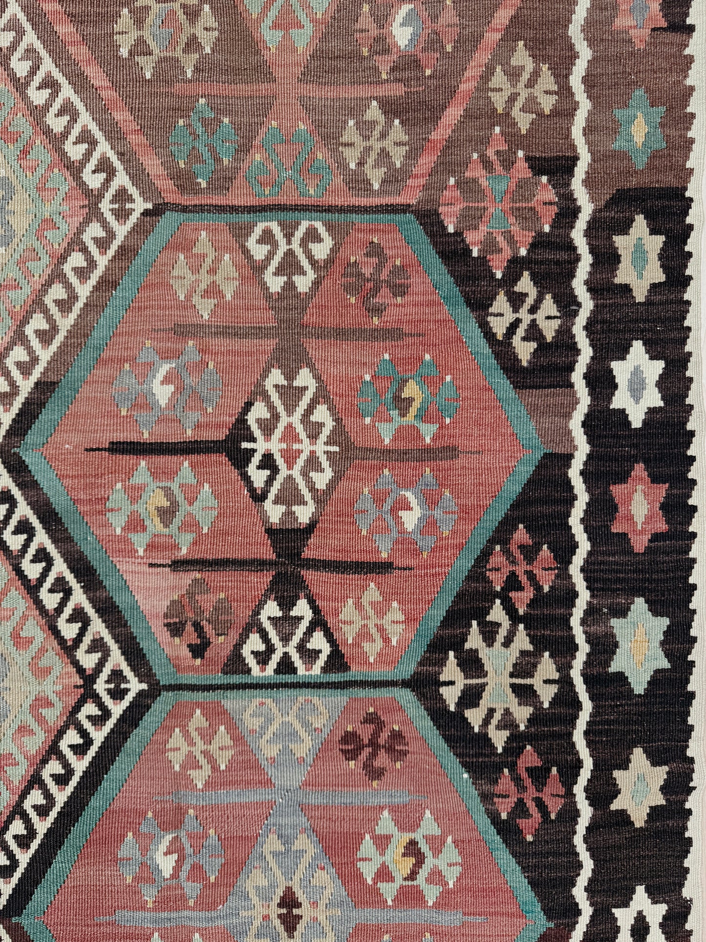 Vintage Kayseri Turkish kilim rug with earthy colors and geometric design, handmade wool flatweave 5x11 from Indigo Rugs Burlingame Bay Area.