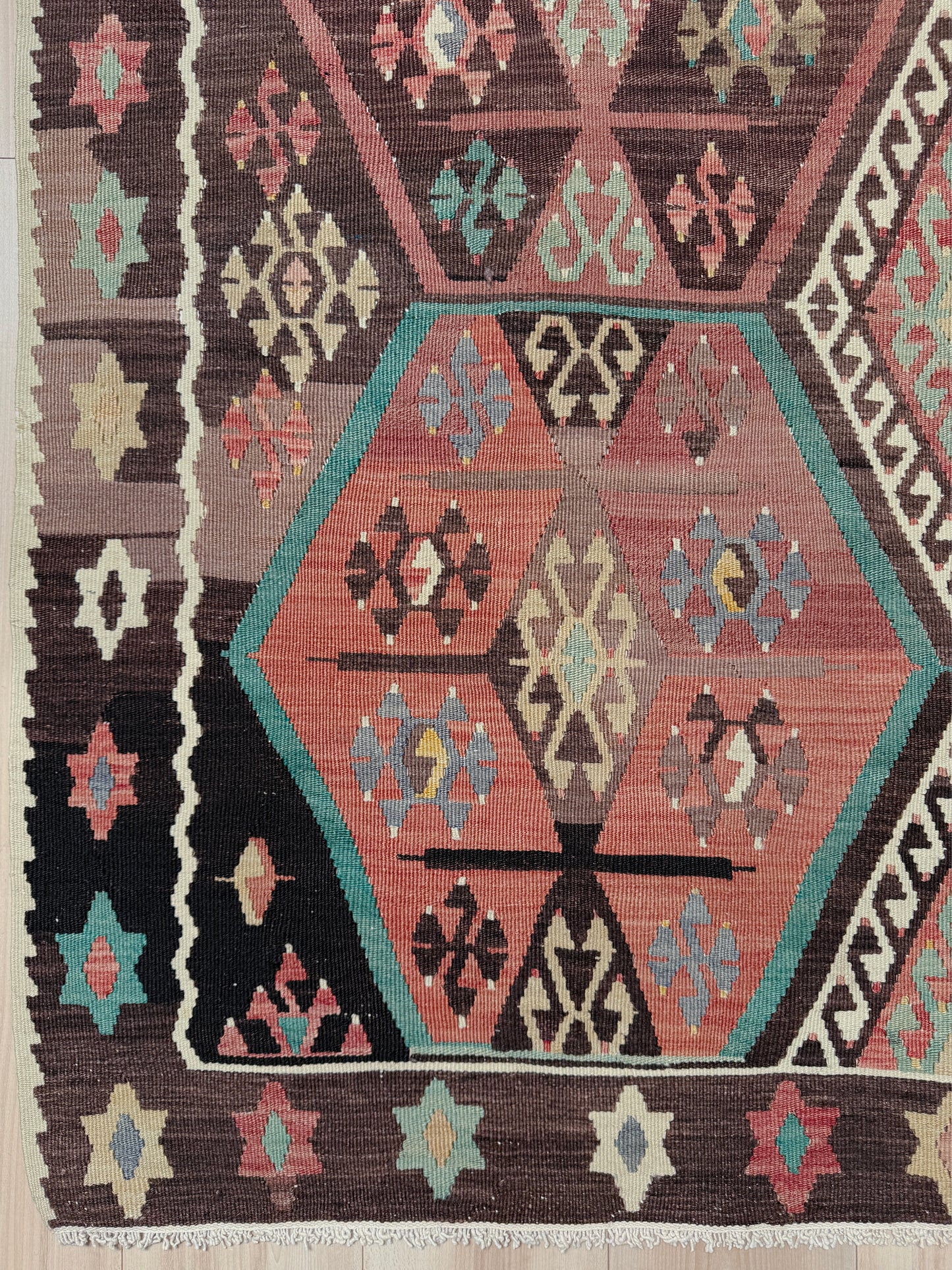 Vintage Kayseri Turkish kilim rug with earthy colors and geometric design, handmade wool flatweave 5x11 from Indigo Rugs Burlingame Bay Area.