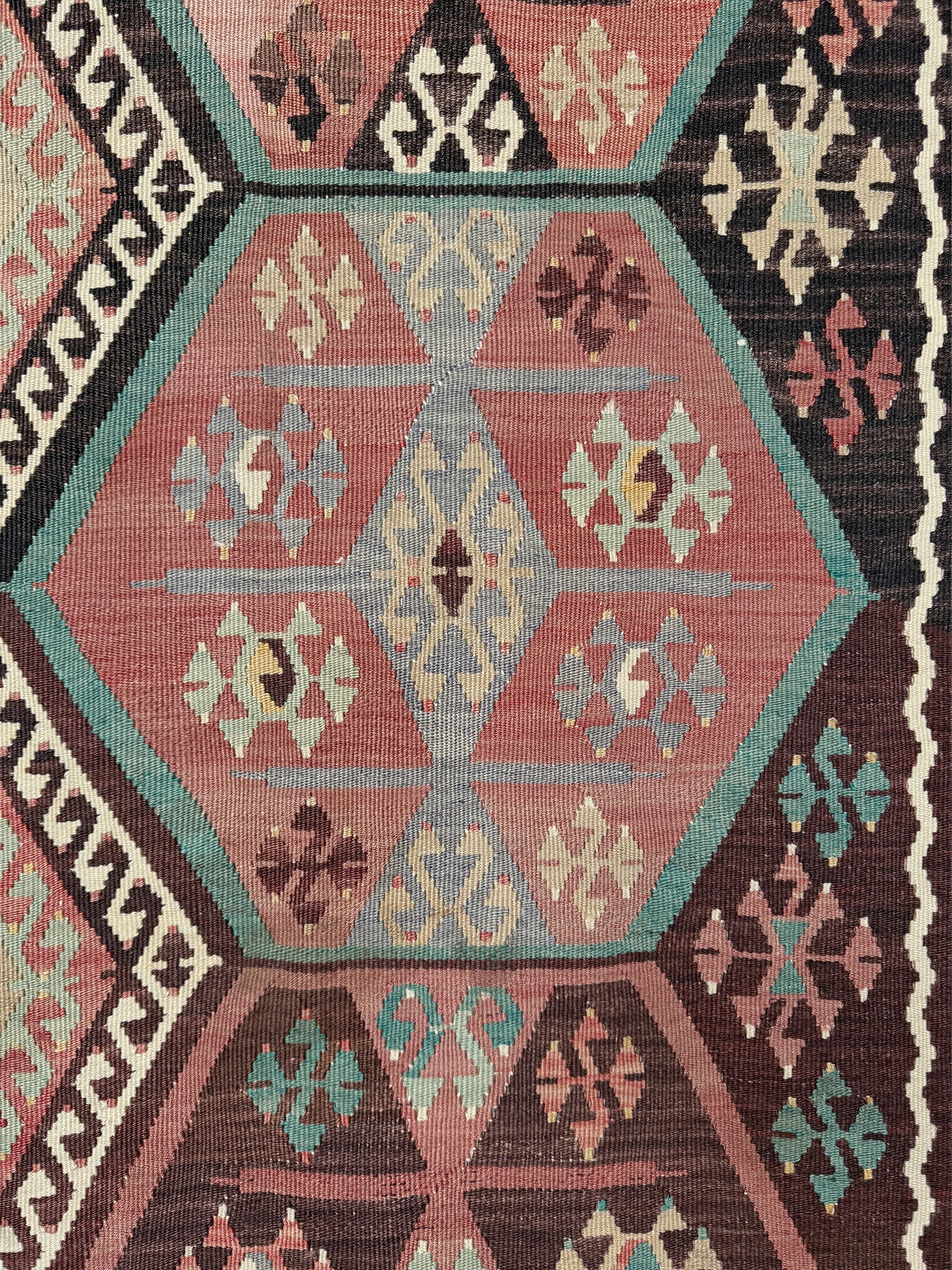 Vintage Kayseri Turkish kilim rug with earthy colors and geometric design, handmade wool flatweave 5x11 from Indigo Rugs Burlingame Bay Area.