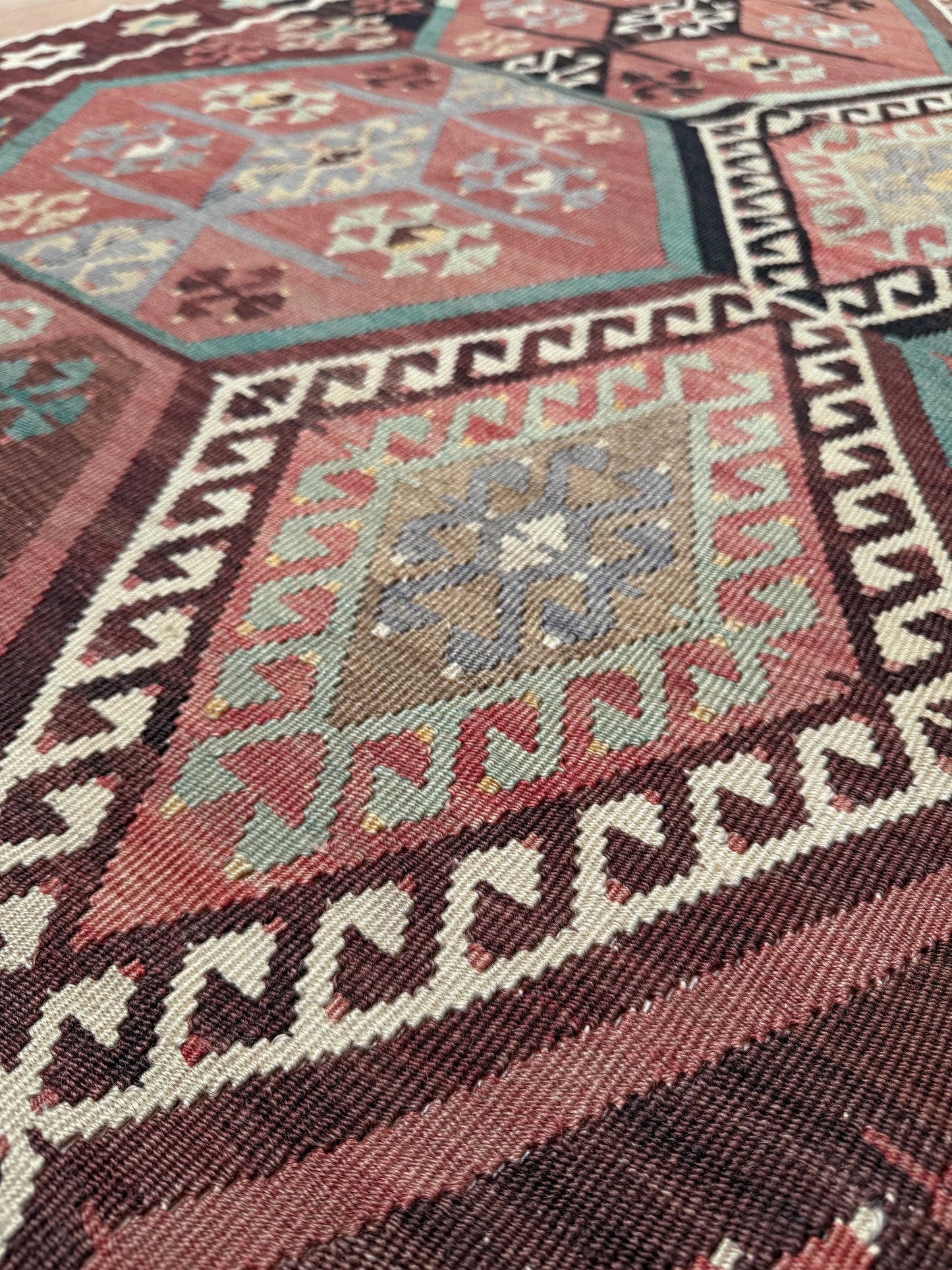 Vintage Kayseri Turkish kilim rug with earthy colors and geometric design, handmade wool flatweave 5x11 from Indigo Rugs Burlingame Bay Area.