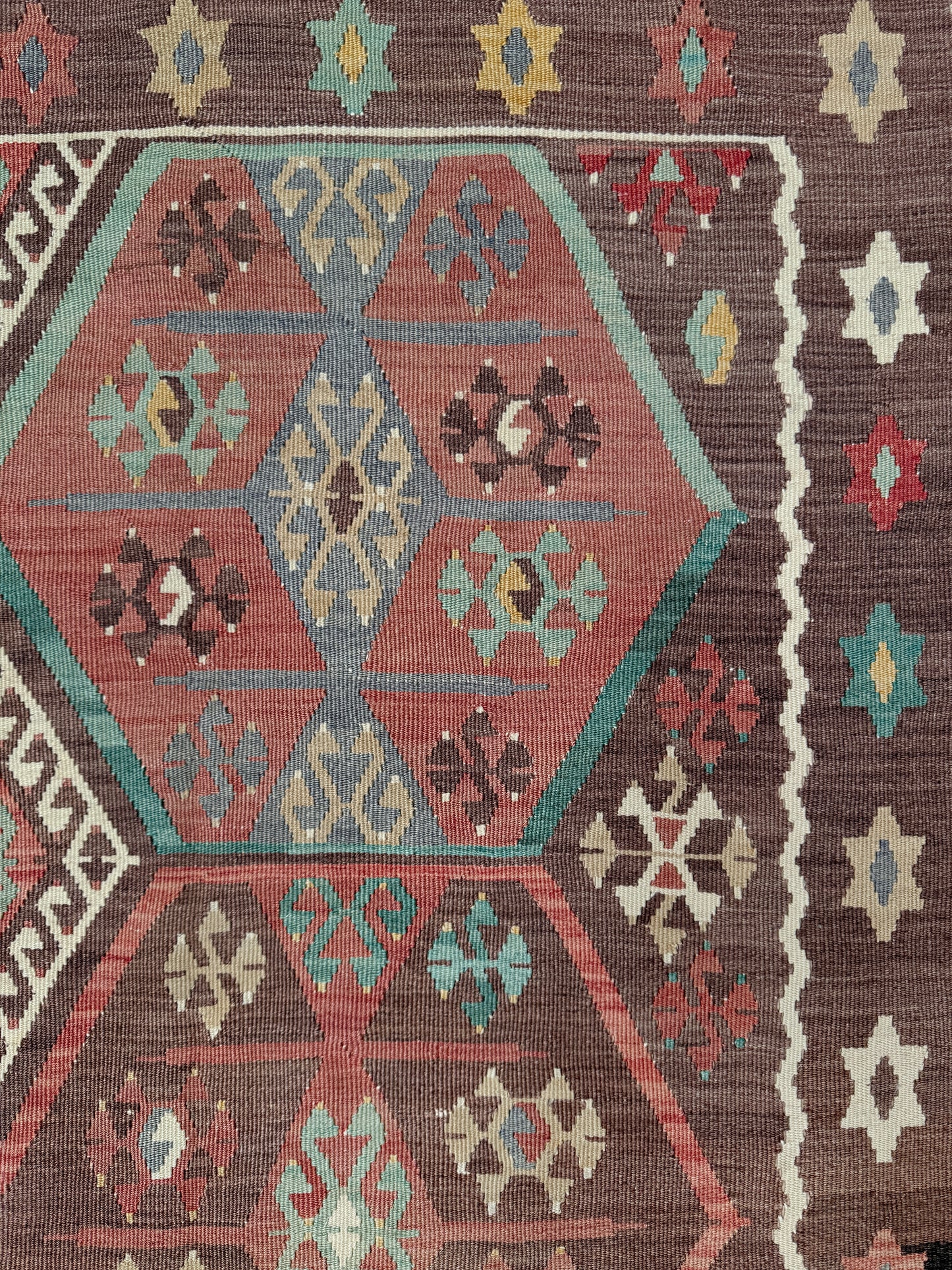 Vintage Kayseri Turkish kilim rug with earthy colors and geometric design, handmade wool flatweave 5x11 from Indigo Rugs Burlingame Bay Area.