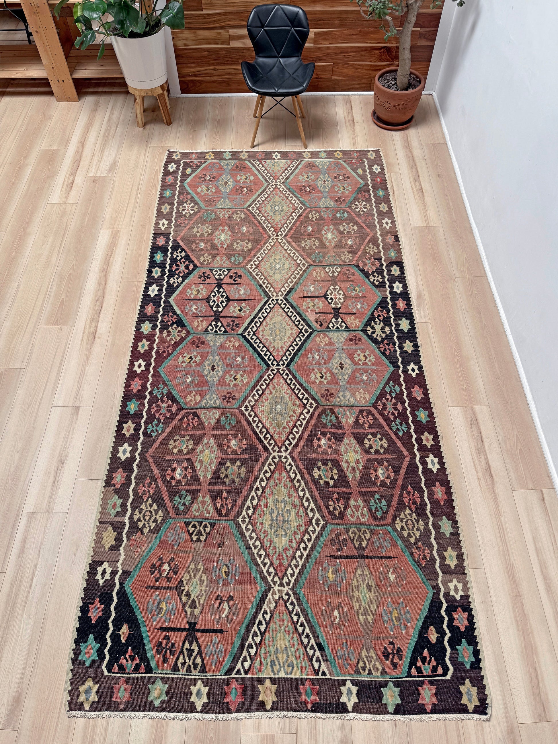 Vintage Kayseri Turkish kilim rug with earthy colors and blue-gray geometric medallions, handmade wool flatweave 5x11 from Indigo Rugs Burlingame Bay Area.