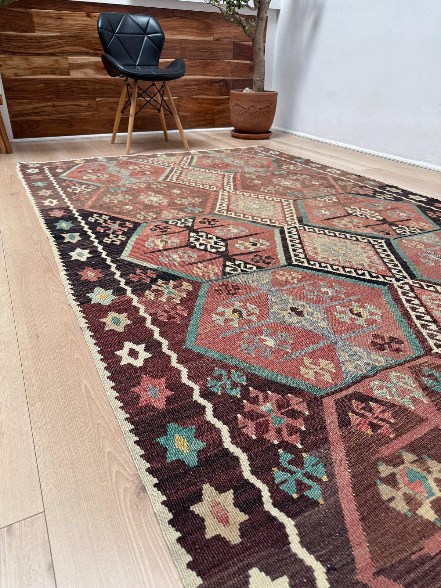 Vintage Kayseri Turkish kilim rug with earthy colors and blue-gray geometric medallions, handmade wool flatweave 5x11 from Indigo Rugs Burlingame Bay Area.