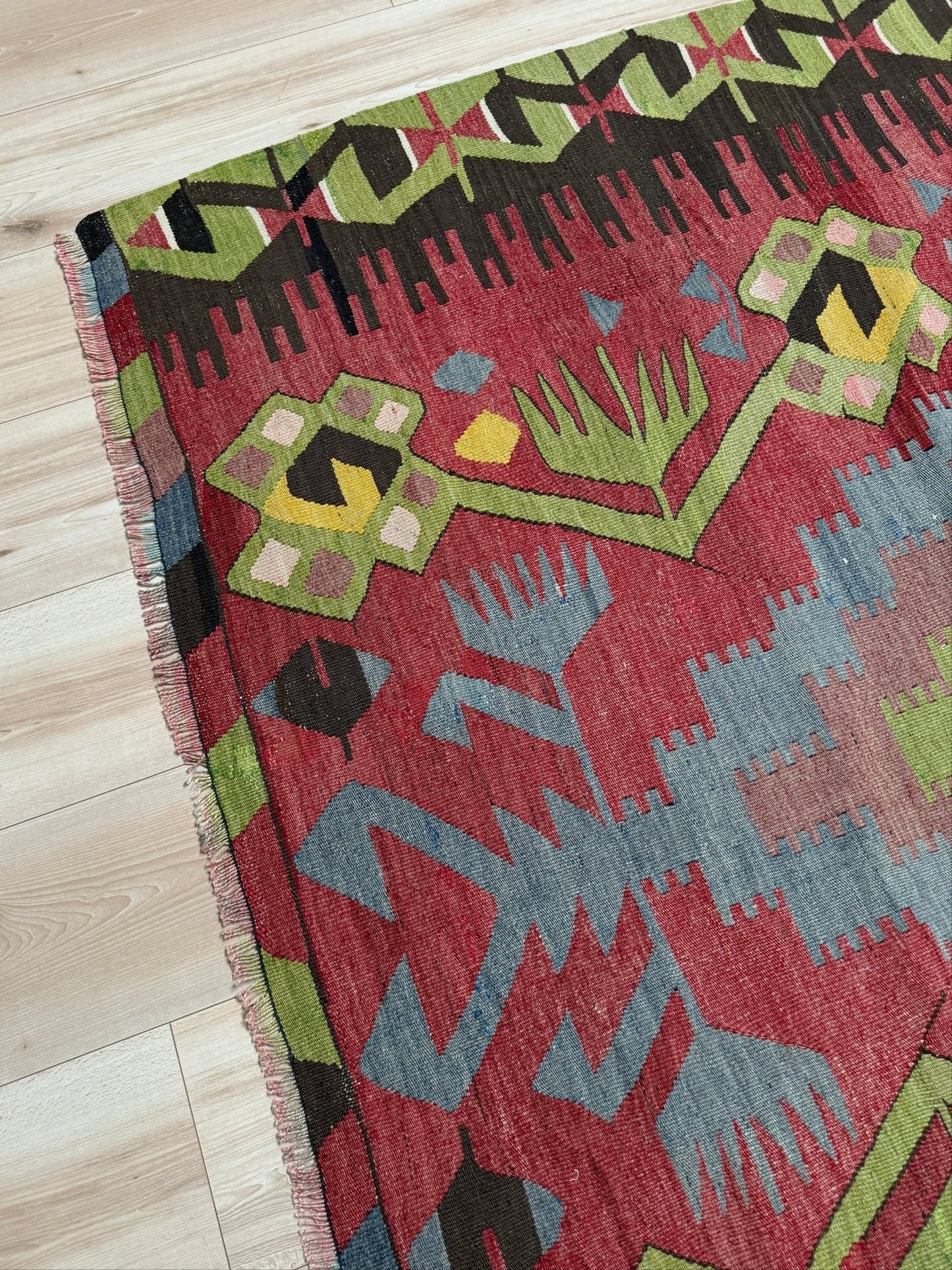 Vintage Esme Turkish kilim rug featuring in madder red, olive green colors, geometric medallions, handmade Anatolian wool flatweave rug measuring 6x10 in excellent vintage condition.