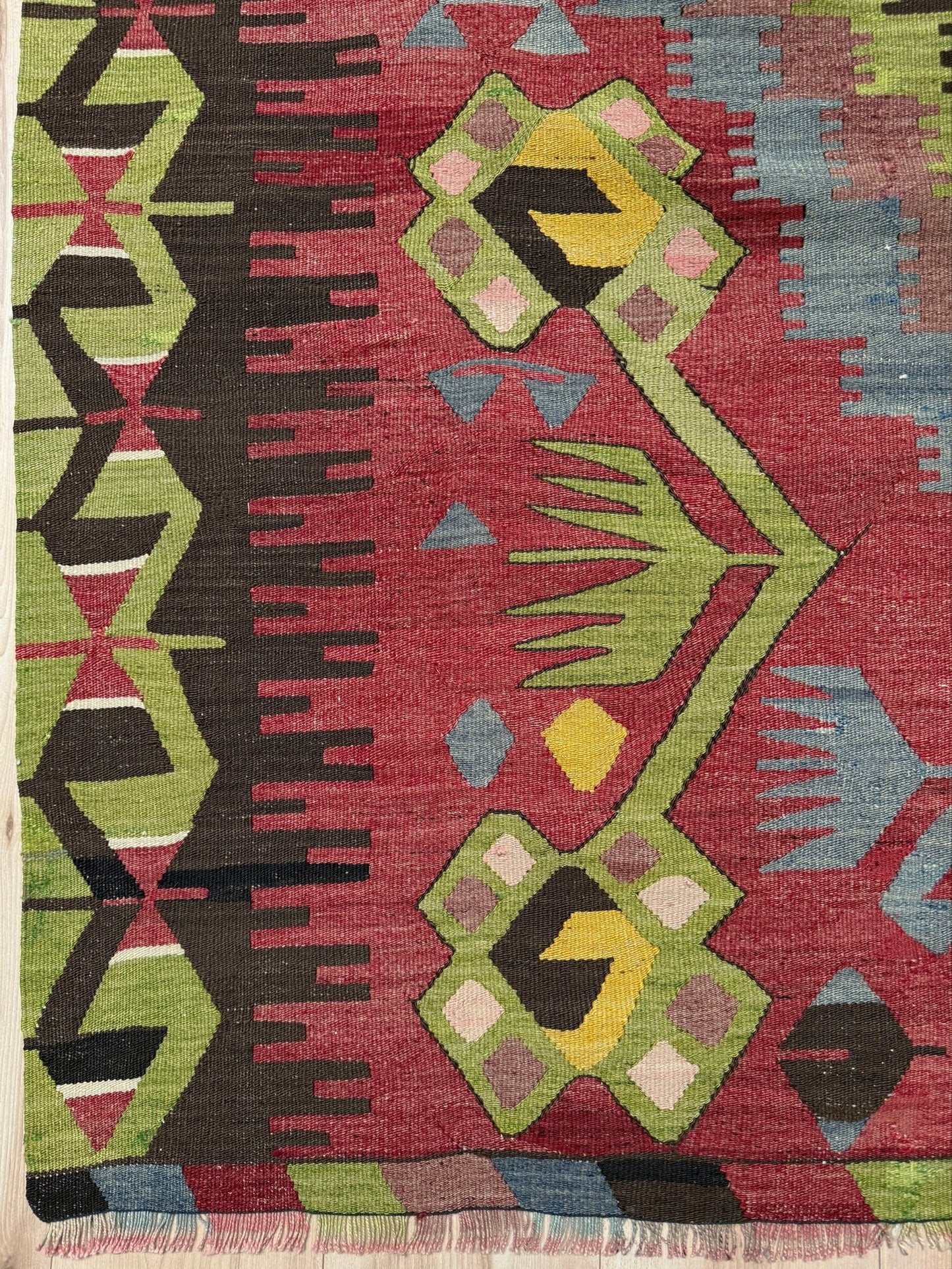 Vintage Esme Turkish kilim rug featuring in madder red, olive green colors, geometric medallions, handmade Anatolian wool flatweave rug measuring 6x10 in excellent vintage condition.