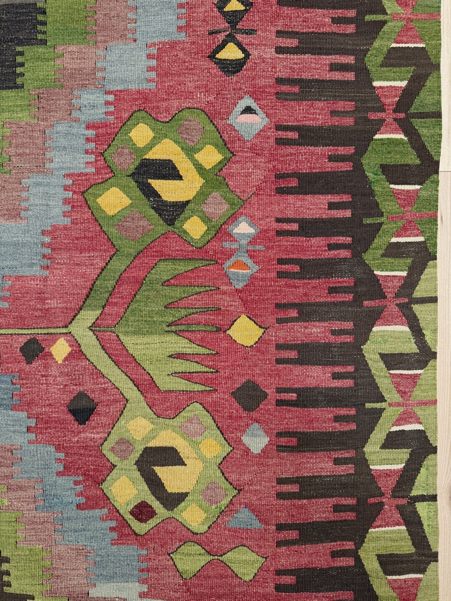 Vintage Esme Turkish kilim rug featuring in madder red, olive green colors, geometric medallions, handmade Anatolian wool flatweave rug measuring 6x10 in excellent vintage condition.
