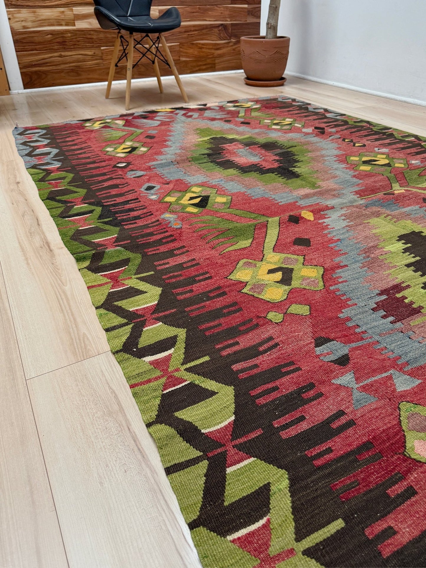 Vintage Esme Turkish kilim rug featuring in madder red, olive green colors, geometric medallions, handmade Anatolian wool flatweave rug measuring 6x10 in excellent vintage condition.