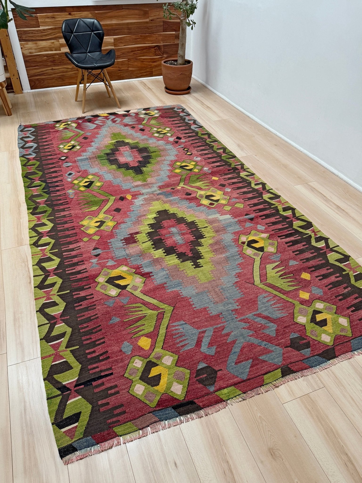 Vintage Esme Turkish kilim rug featuring in madder red, olive green colors, geometric medallions, handmade Anatolian wool flatweave rug measuring 6x10 in excellent vintage condition.