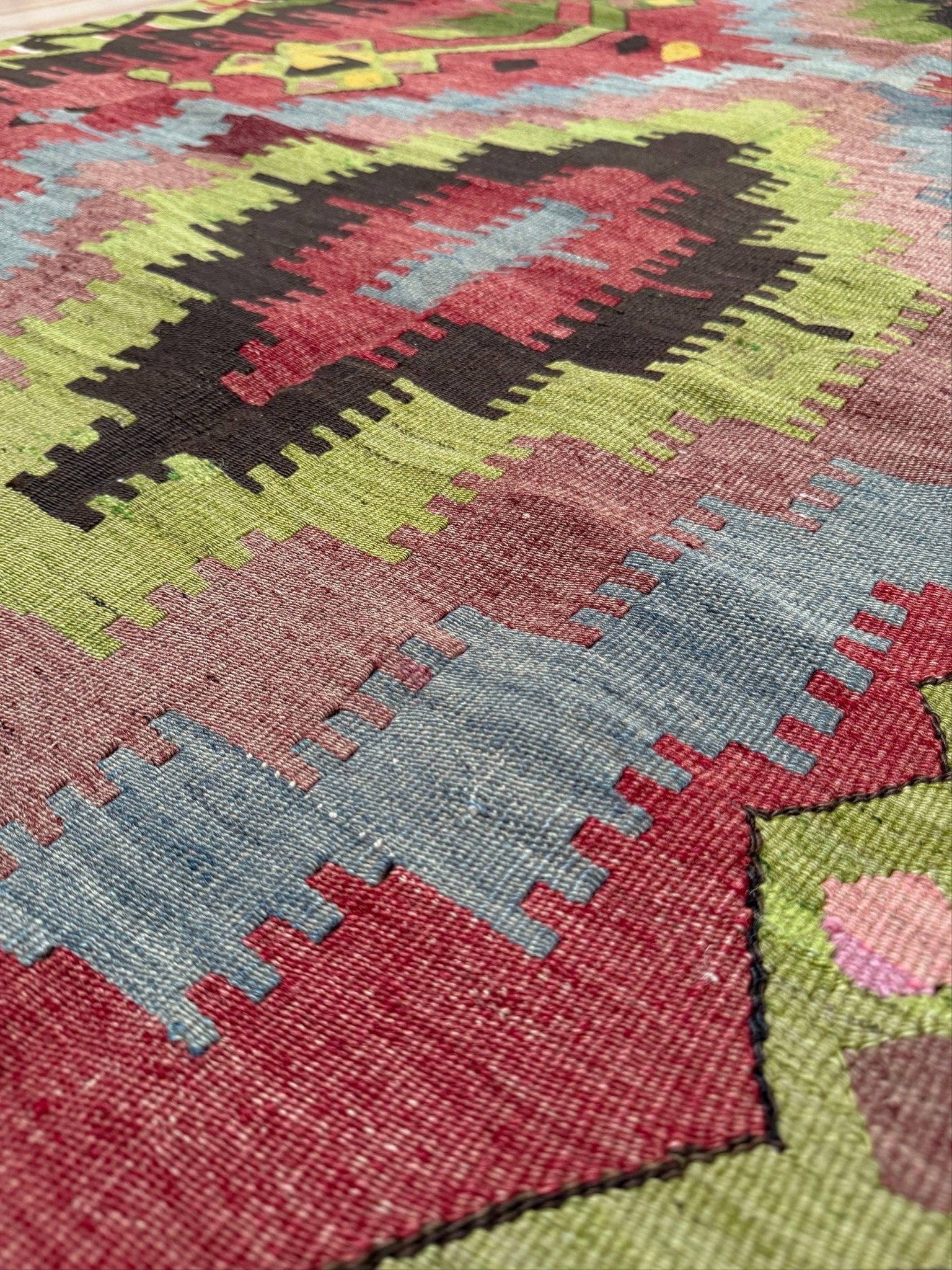 Vintage Esme Turkish kilim rug featuring in madder red, olive green colors, geometric medallions, handmade Anatolian wool flatweave rug measuring 6x10 in excellent vintage condition.