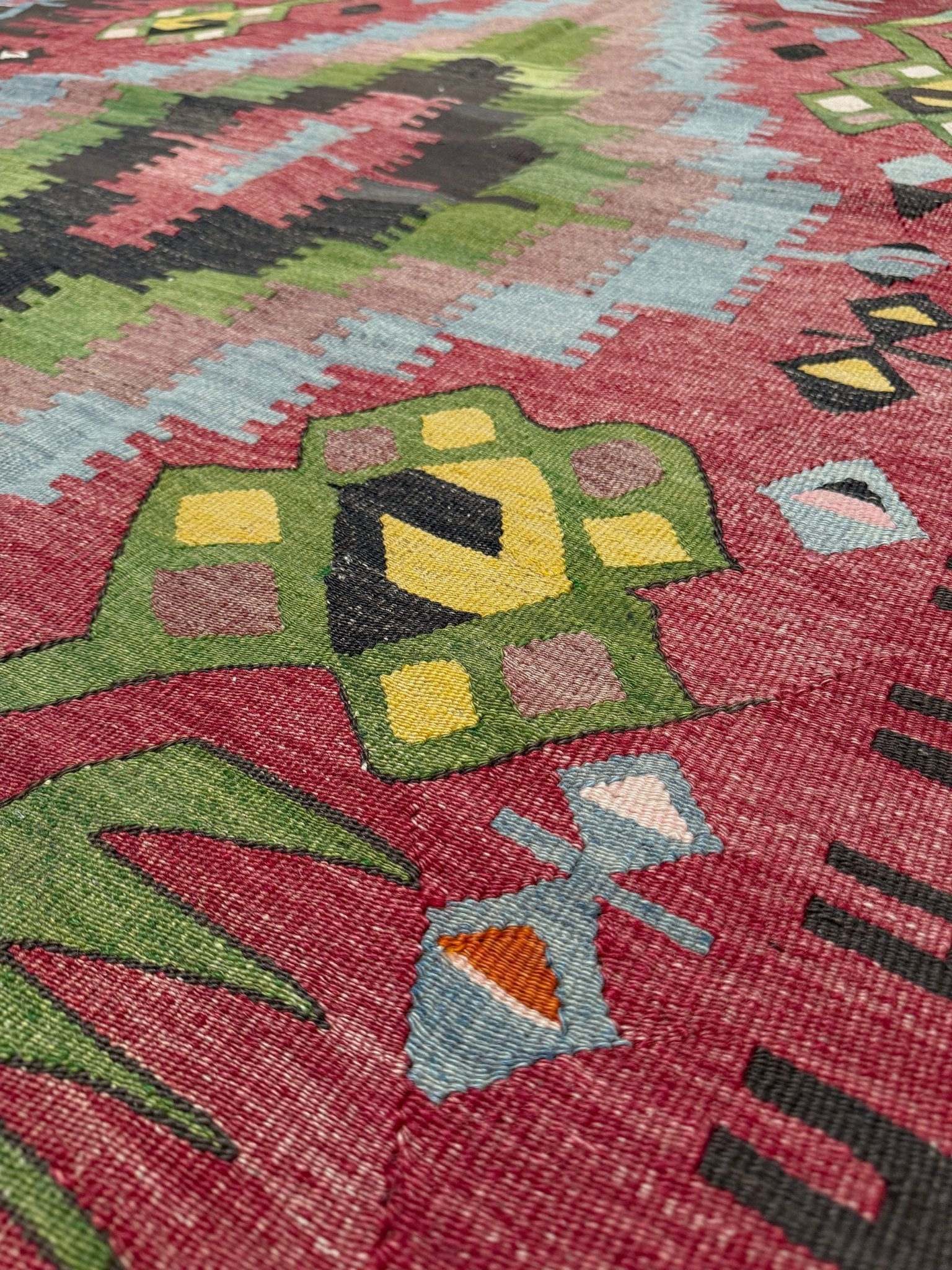 Vintage Esme Turkish kilim rug featuring in madder red, olive green colors, geometric medallions, handmade Anatolian wool flatweave rug measuring 6x10 in excellent vintage condition.