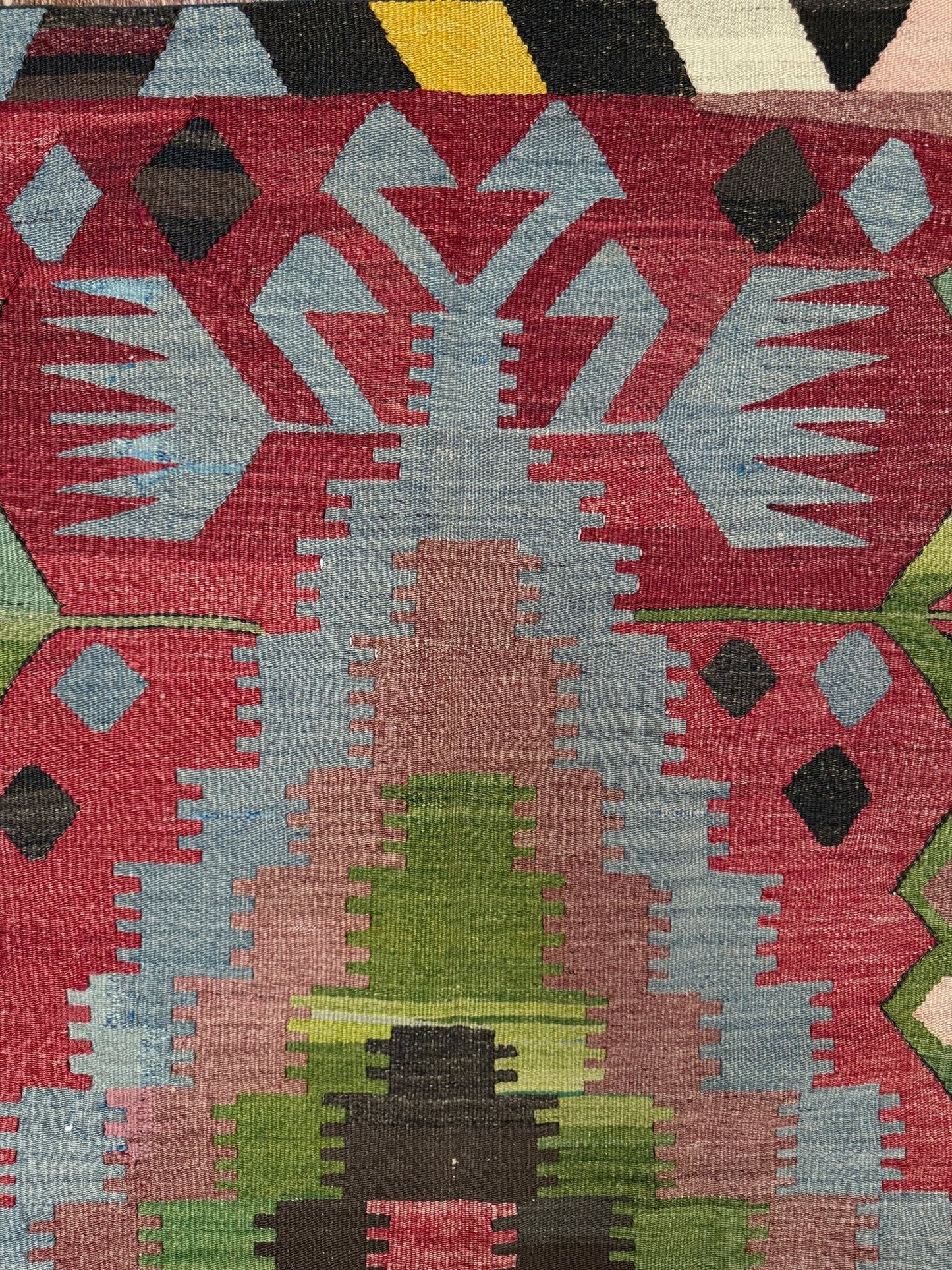 Vintage Esme Turkish kilim rug featuring in madder red, olive green colors, geometric medallions, handmade Anatolian wool flatweave rug measuring 6x10 in excellent vintage condition.