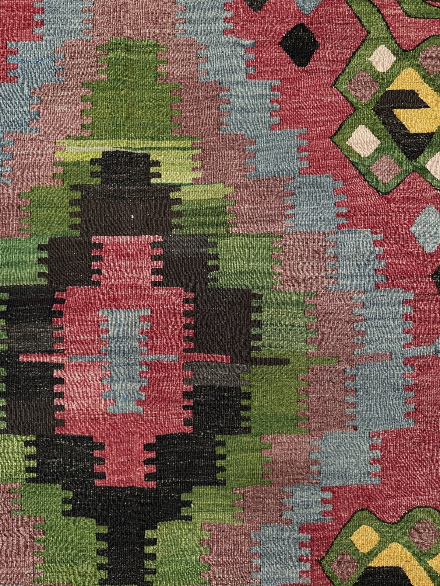 Vintage Esme Turkish kilim rug featuring in madder red, olive green colors, geometric medallions, handmade Anatolian wool flatweave rug measuring 6x10 in excellent vintage condition.