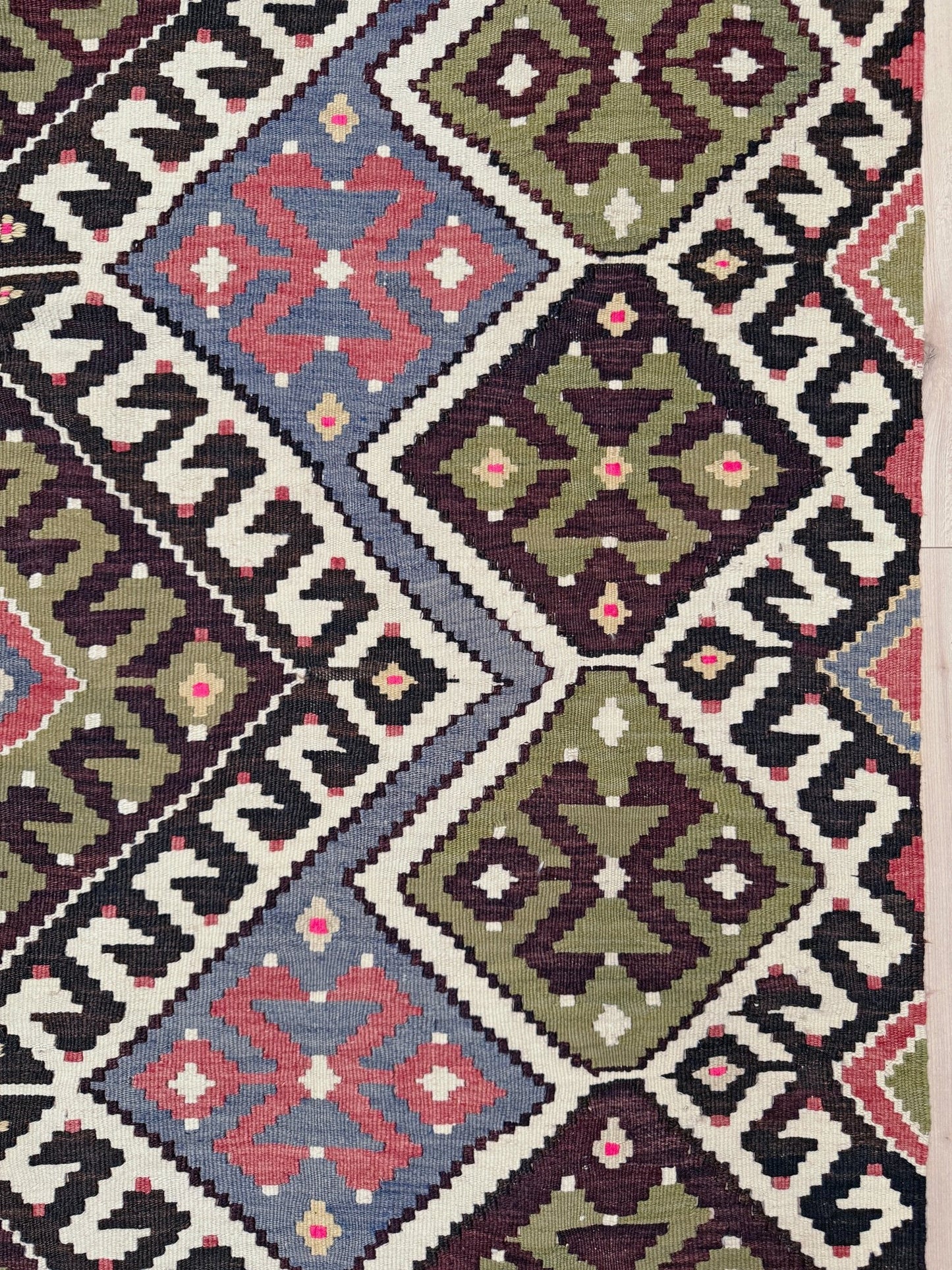 Vintage Esme Turkish kilim rug with repeating diamond medallions in muted olive green, deep plum, dusty periwinkle blue, handmade wool flatweave 6x12 from Indigo Rugs Burlingame Bay Area.