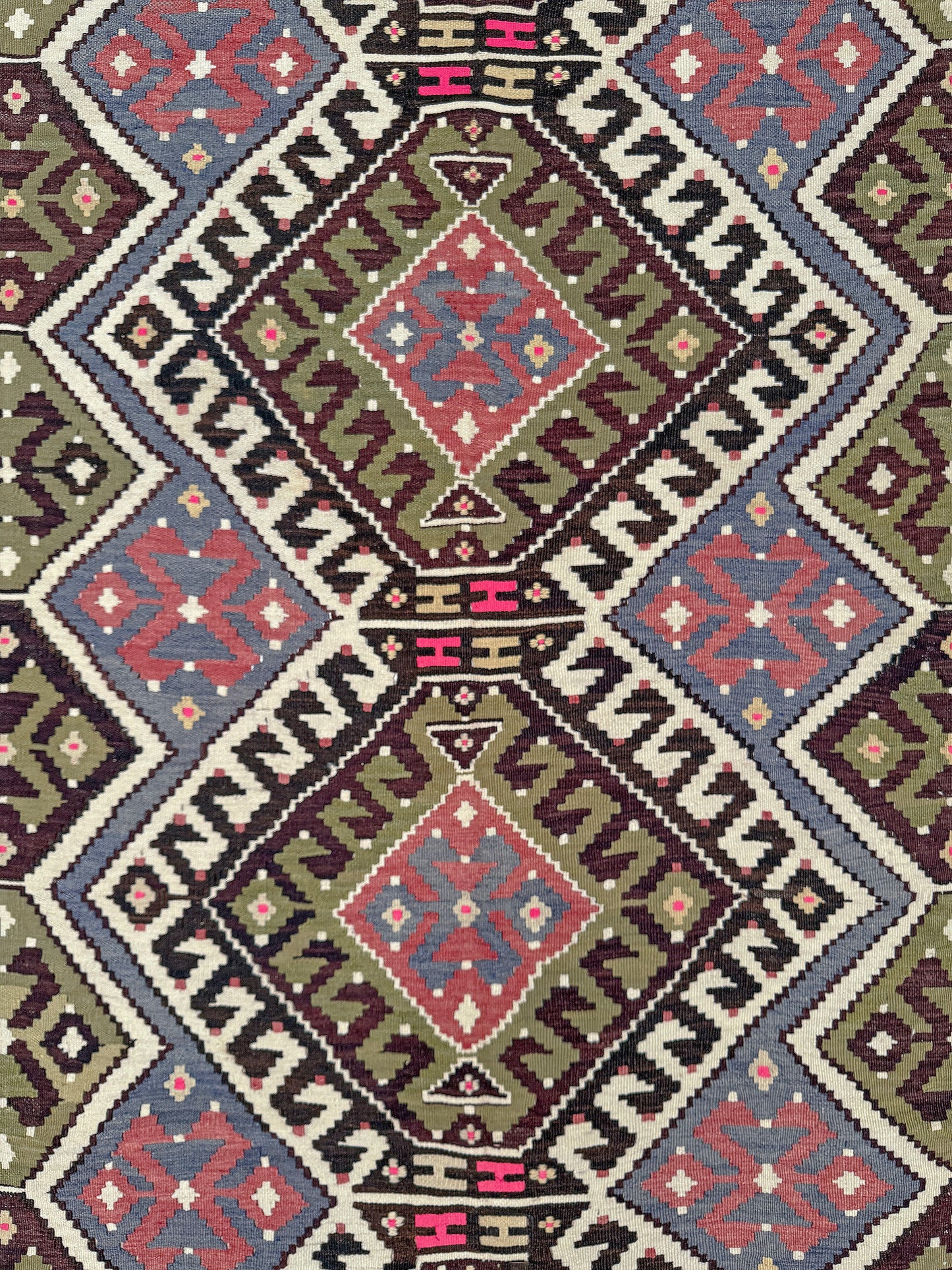 Vintage Esme Turkish kilim rug with repeating diamond medallions in muted olive green, deep plum, dusty periwinkle blue, handmade wool flatweave 6x12 from Indigo Rugs Burlingame Bay Area.