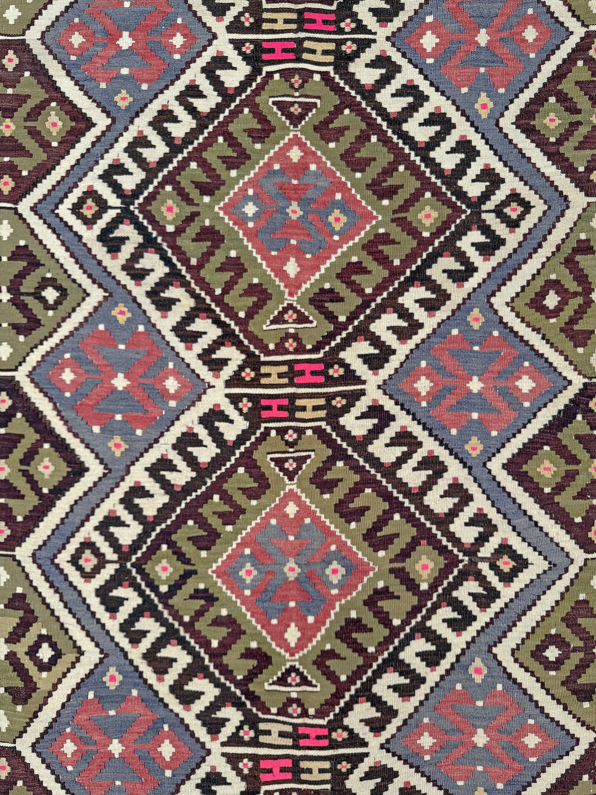 Vintage Esme Turkish kilim rug with repeating diamond medallions in muted olive green, deep plum, dusty periwinkle blue, handmade wool flatweave 6x12 from Indigo Rugs Burlingame Bay Area.