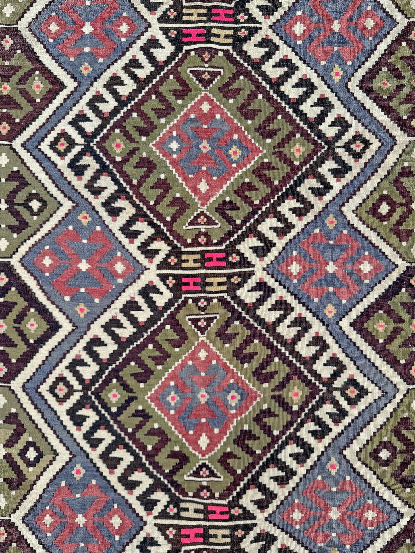 Vintage Esme Turkish kilim rug with repeating diamond medallions in muted olive green, deep plum, dusty periwinkle blue, handmade wool flatweave 6x12 from Indigo Rugs Burlingame Bay Area.