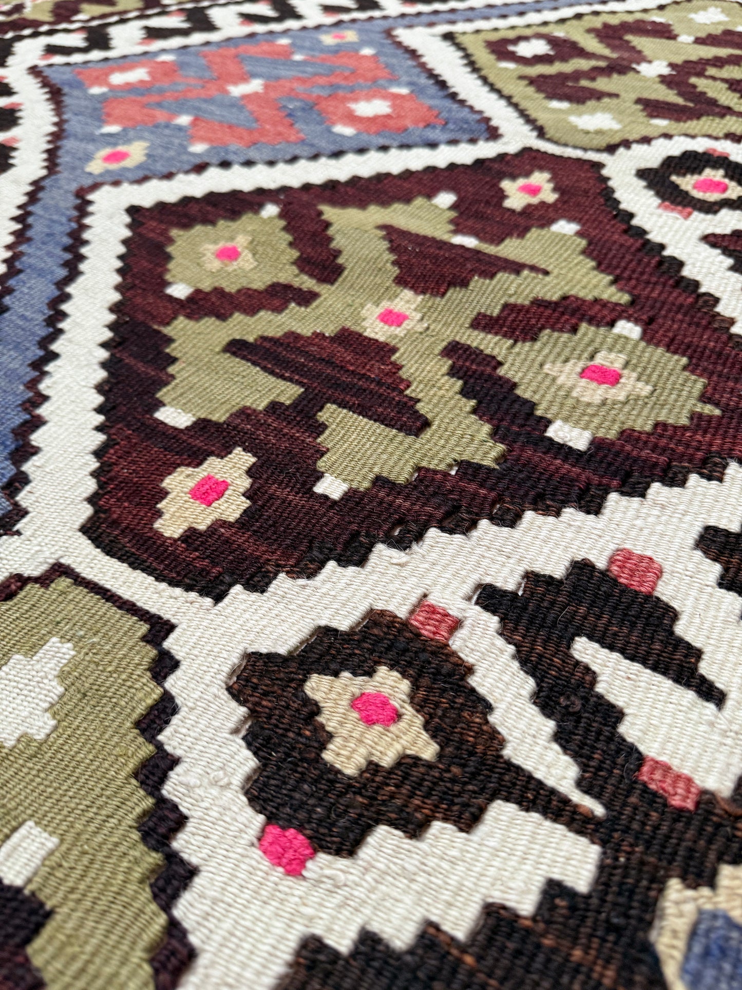 Vintage Esme Turkish kilim rug with repeating diamond medallions in muted olive green, deep plum, dusty periwinkle blue, handmade wool flatweave 6x12 from Indigo Rugs Burlingame Bay Area.