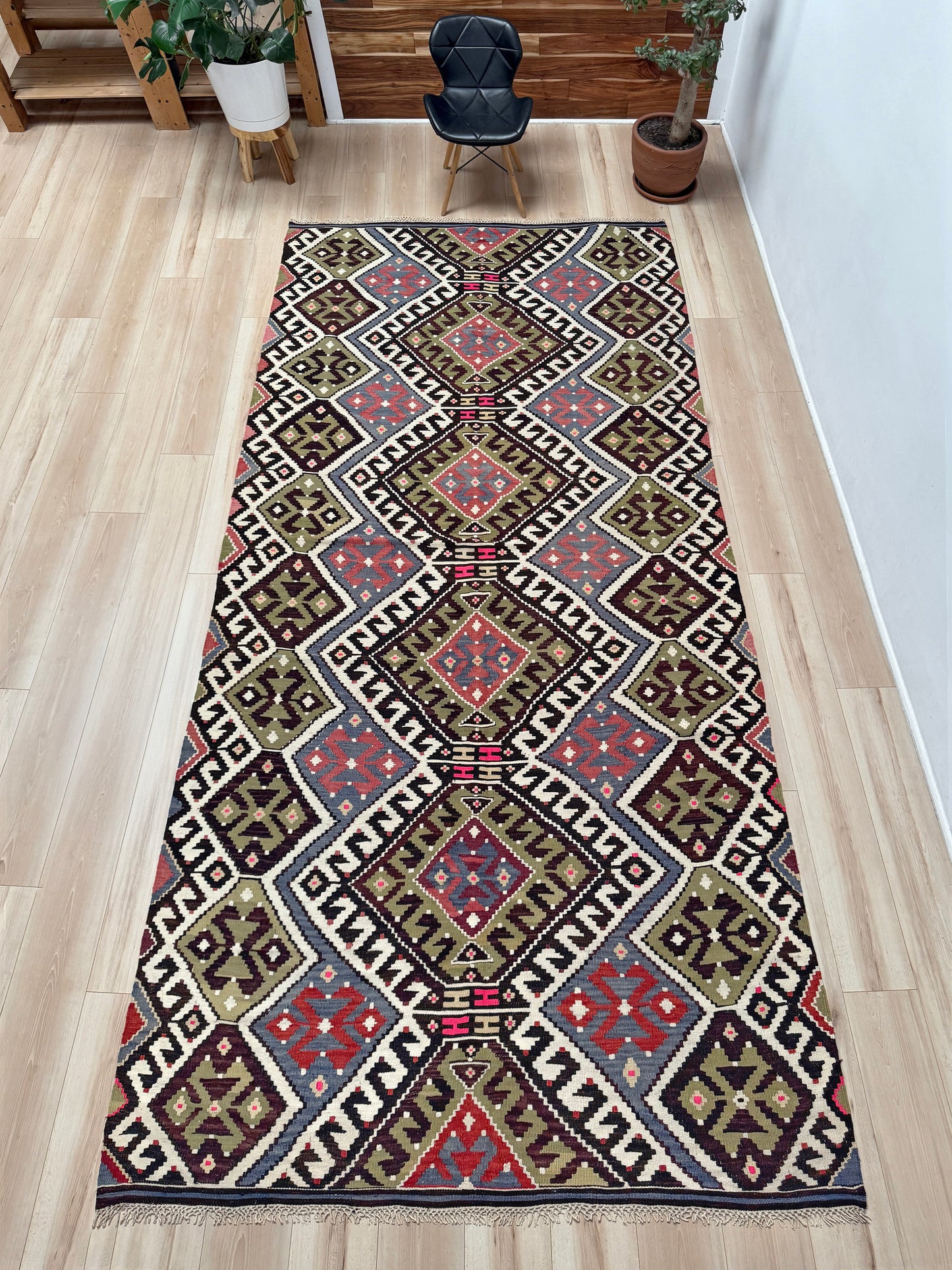 Vintage Esme Turkish kilim rug with repeating diamond medallions in muted olive green, deep plum, dusty periwinkle blue, handmade wool flatweave 6x12 from Indigo Rugs Burlingame Bay Area.