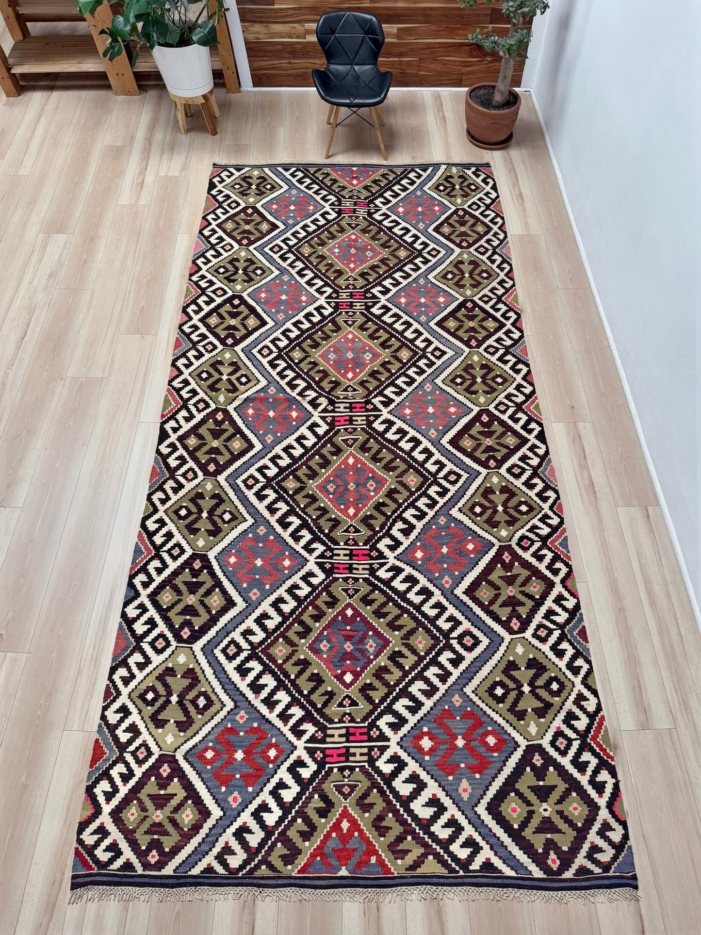 Vintage Esme Turkish kilim rug with repeating diamond medallions in muted olive green, deep plum, dusty periwinkle blue, handmade wool flatweave 6x12 from Indigo Rugs Burlingame Bay Area.