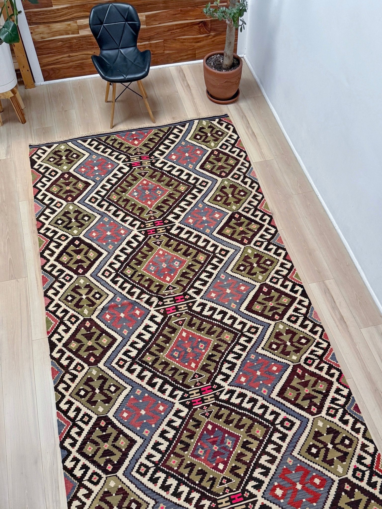 Vintage Esme Turkish kilim rug with repeating diamond medallions in muted olive green, deep plum, dusty periwinkle blue, handmade wool flatweave 6x12 from Indigo Rugs Burlingame Bay Area.