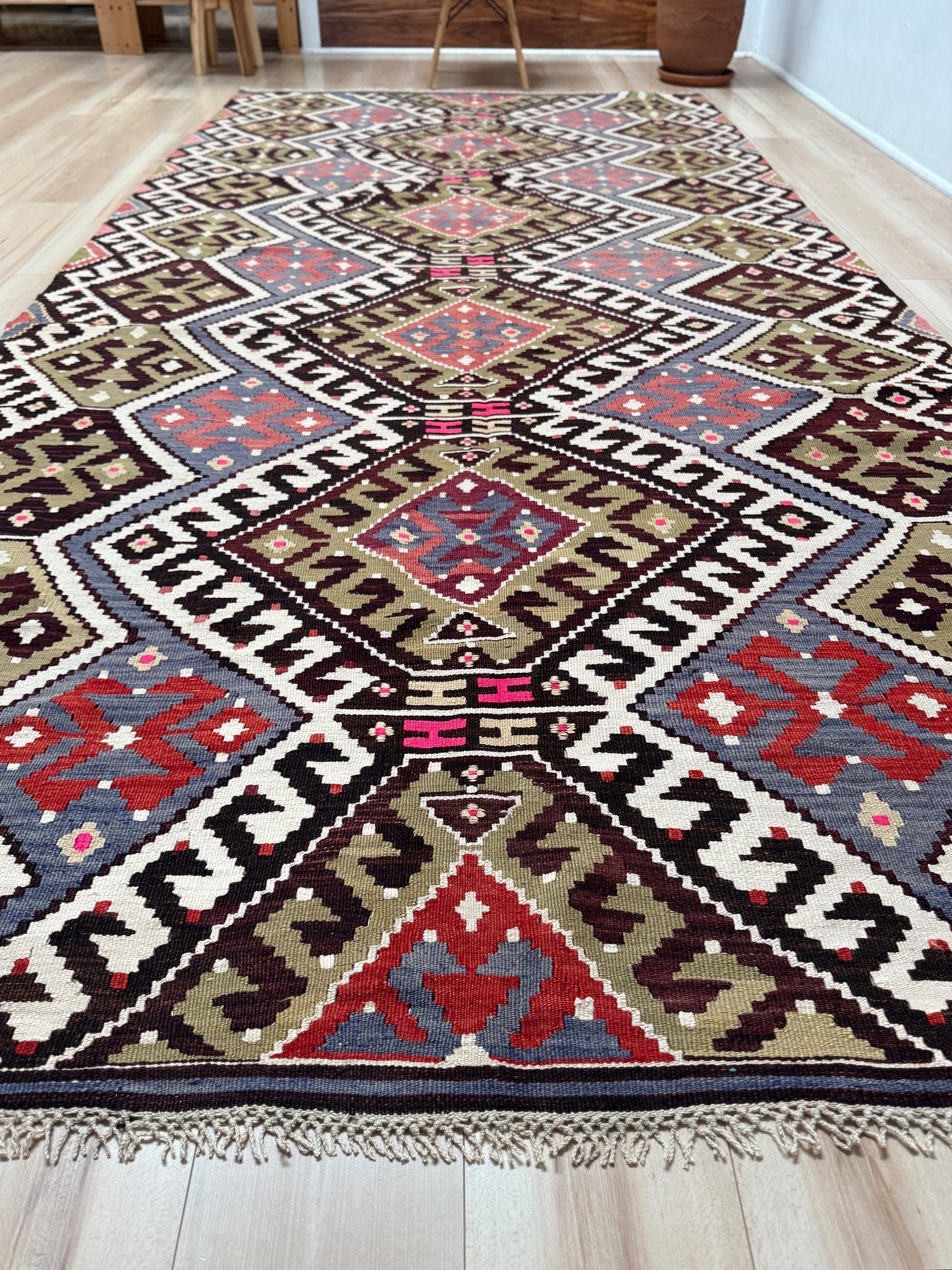Vintage Esme Turkish kilim rug with repeating diamond medallions in muted olive green, deep plum, dusty periwinkle blue, handmade wool flatweave 6x12 from Indigo Rugs Burlingame Bay Area.