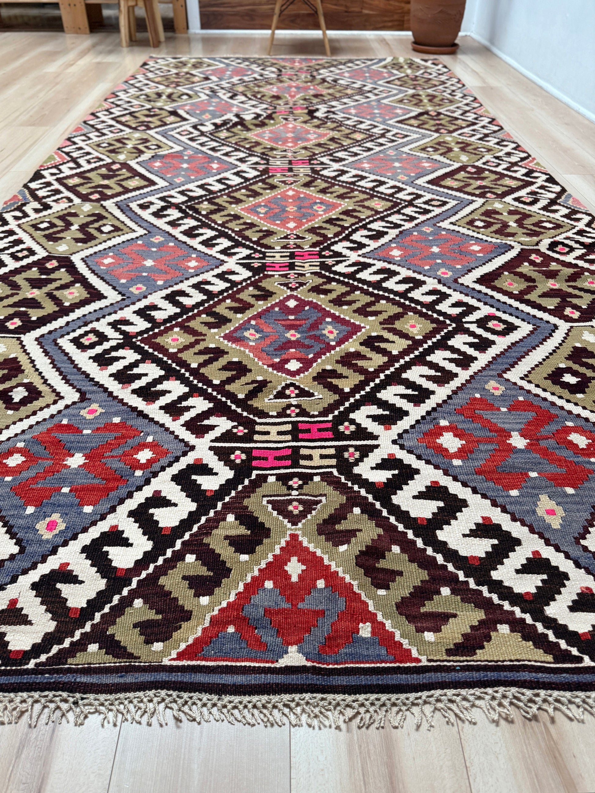 Vintage Esme Turkish kilim rug with repeating diamond medallions in muted olive green, deep plum, dusty periwinkle blue, handmade wool flatweave 6x12 from Indigo Rugs Burlingame Bay Area.