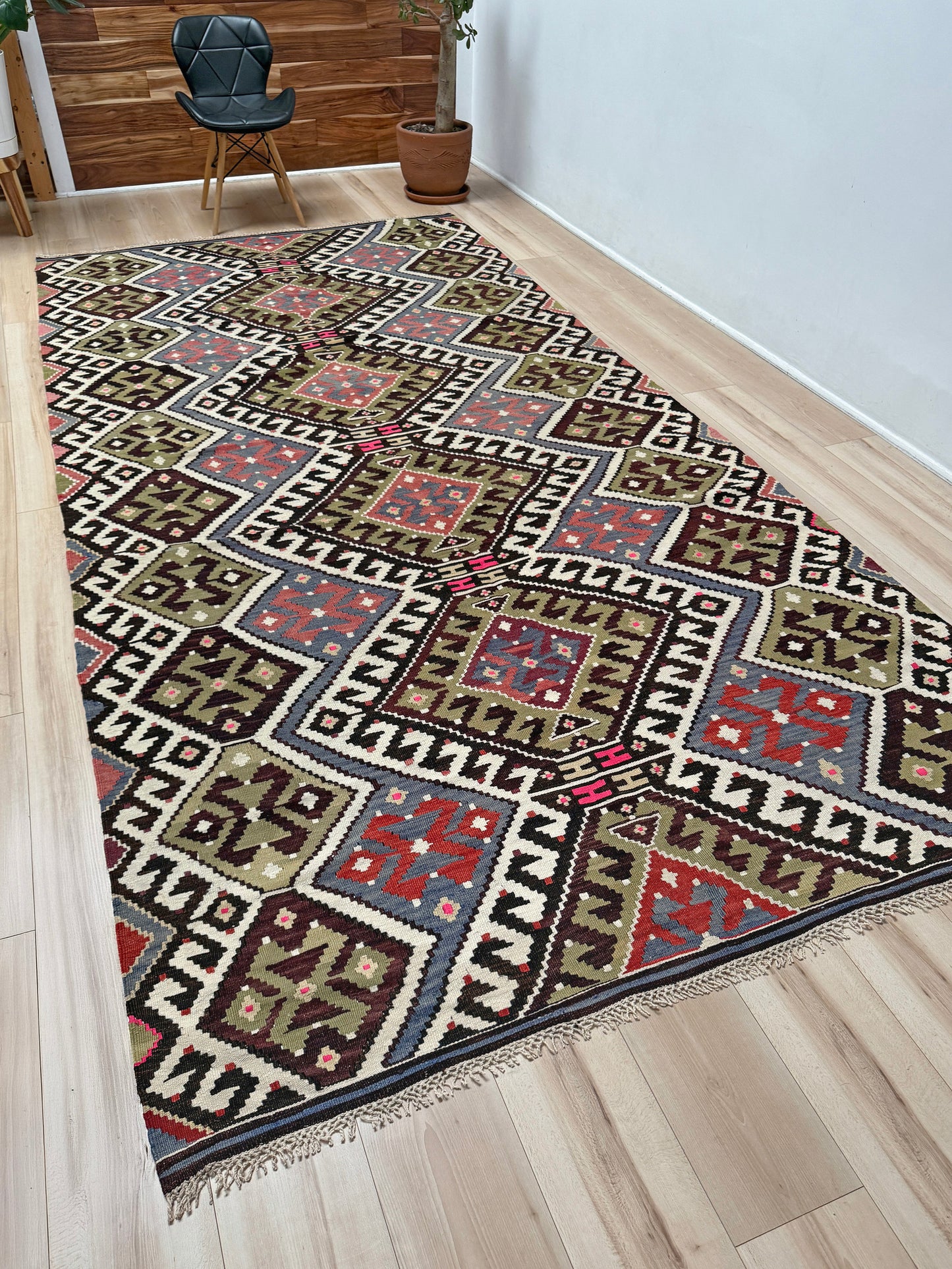 Vintage Esme Turkish kilim rug with repeating diamond medallions in muted olive green, deep plum, dusty periwinkle blue, handmade wool flatweave 6x12 from Indigo Rugs Burlingame Bay Area.