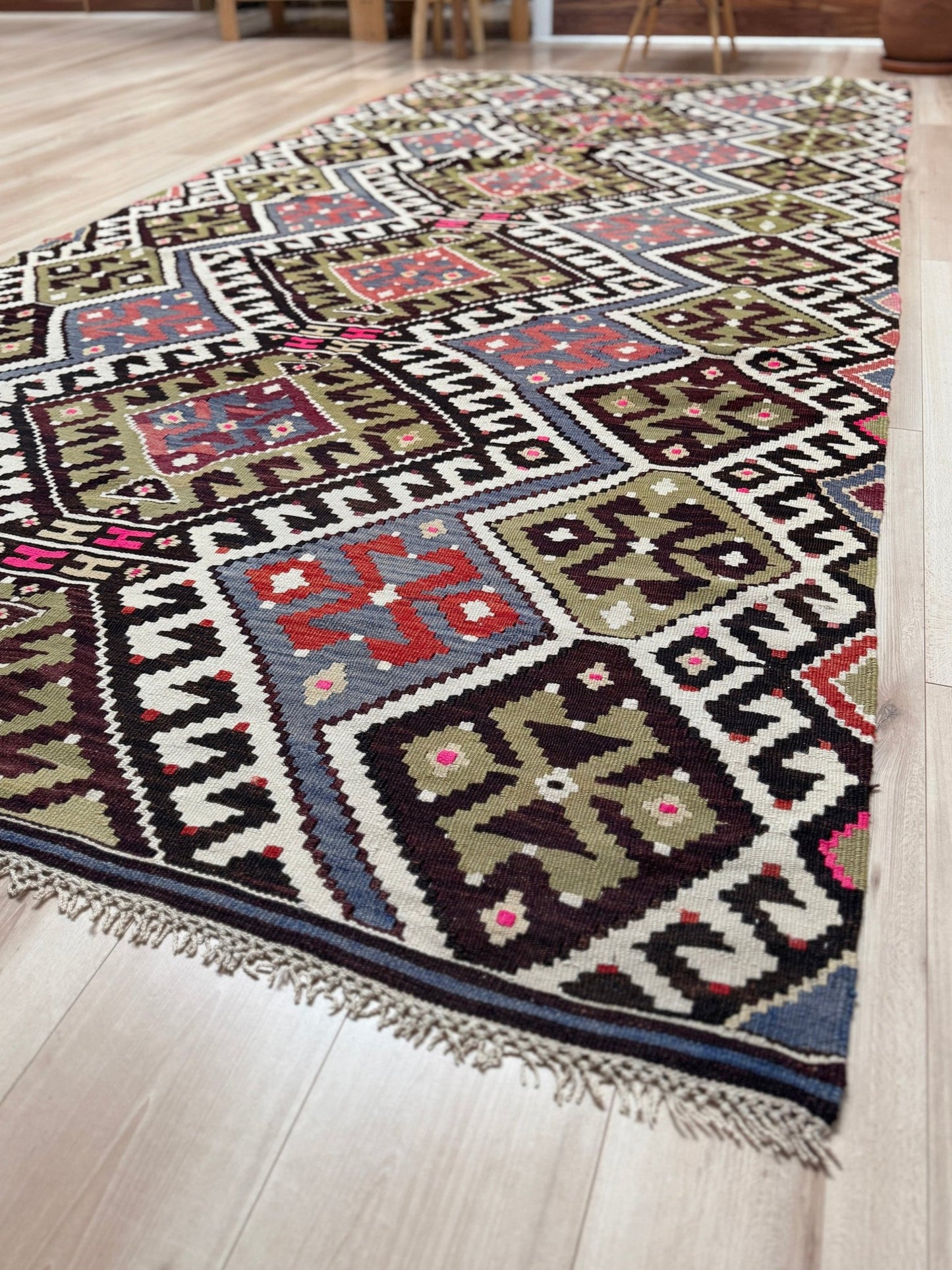 Vintage Esme Turkish kilim rug with repeating diamond medallions in muted olive green, deep plum, dusty periwinkle blue, handmade wool flatweave 6x12 from Indigo Rugs Burlingame Bay Area.
