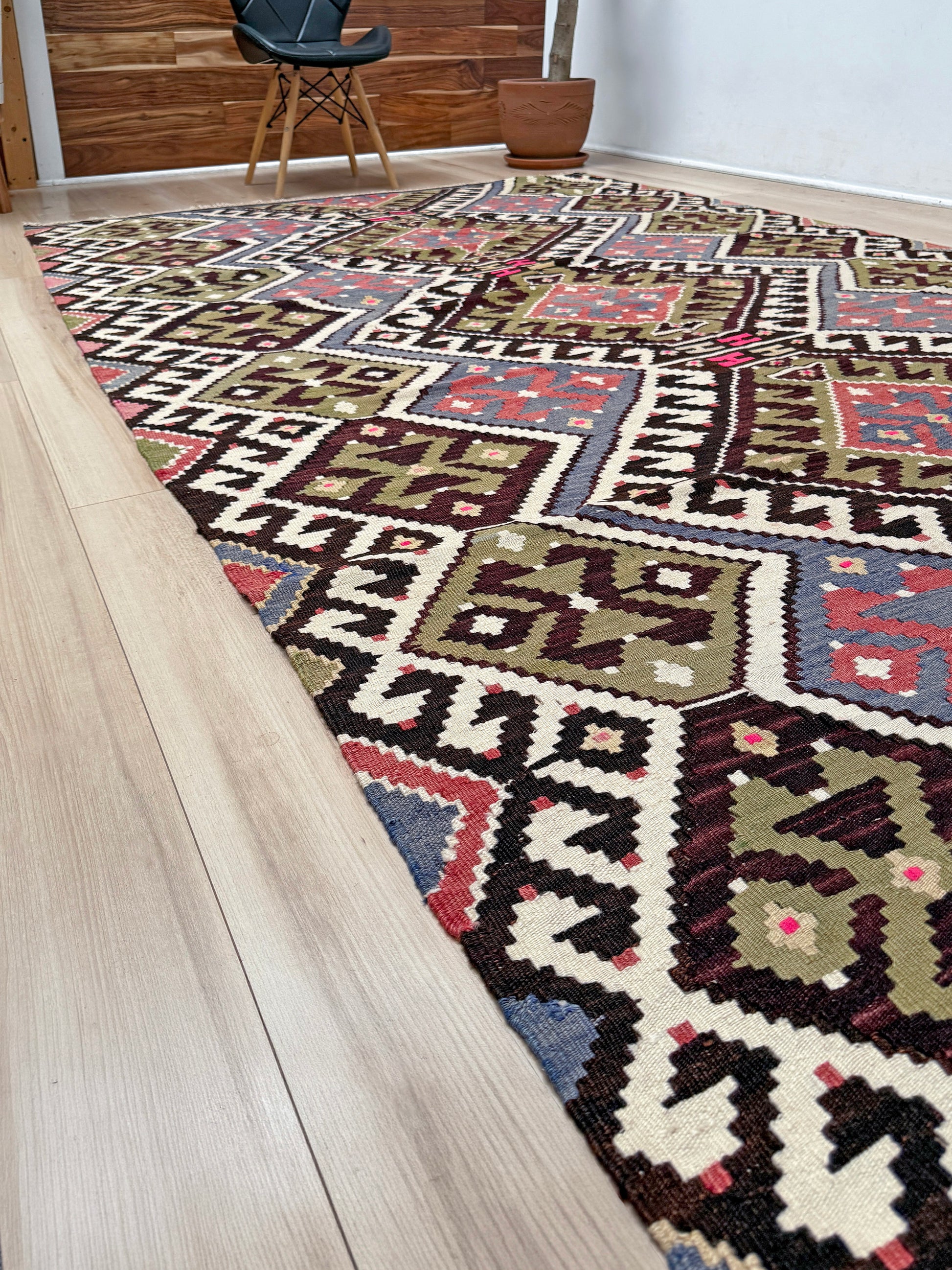 Vintage Esme Turkish kilim rug with repeating diamond medallions in muted olive green, deep plum, dusty periwinkle blue, handmade wool flatweave 6x12 from Indigo Rugs Burlingame Bay Area.