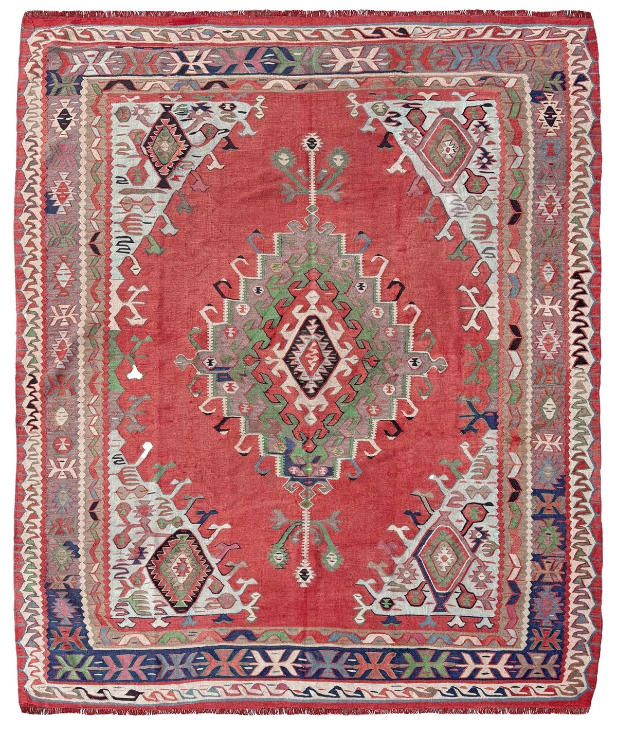 8x10 vintage Turkish Oushak kilim rug with a dusty rose field, geometric tribal medallion, and soft sage, mint, and blue accents — handmade flatweave wool rug from the 1940s