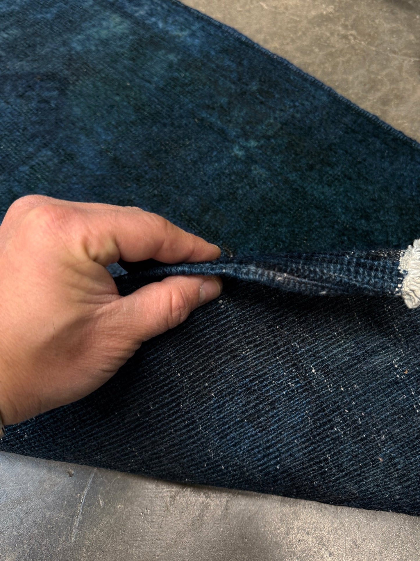 Midnight Blue Turkish overdyed Yastik rug with subtle shadowed motifs. Hand-knotted wool, 20x30 inches. Perfect for: Entryways & apartment foyers, beside the bed, kitchen sink areas, bathroom vanity spots, layered under décor pieces. One-of-a-kind rug from Indigo Rugs in Burlingame, the best rug shop in the San Francisco Bay Area. Free shipping included.