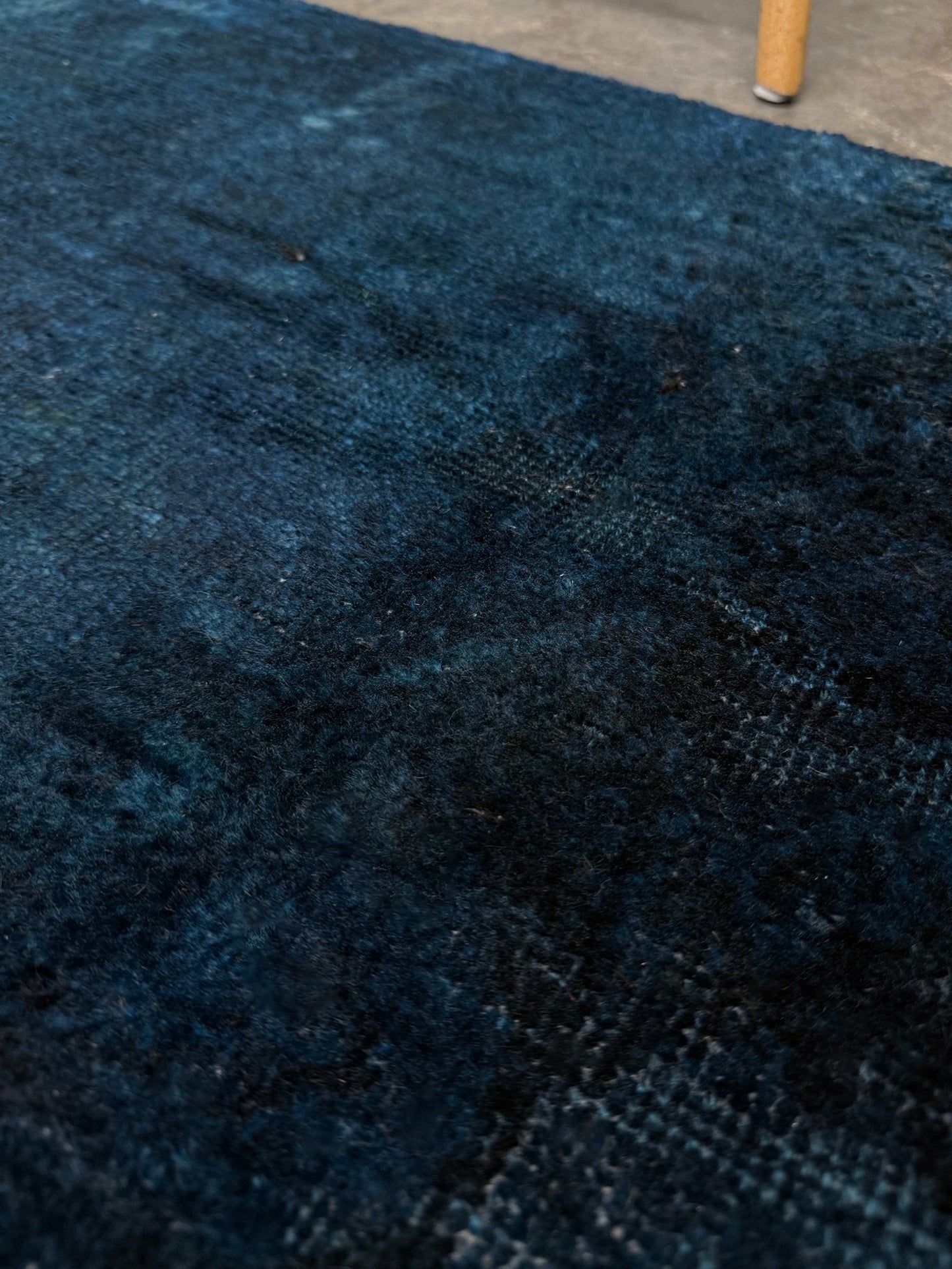 Midnight Blue Turkish overdyed Yastik rug with subtle shadowed motifs. Hand-knotted wool, 20x30 inches. Perfect for: Entryways & apartment foyers, beside the bed, kitchen sink areas, bathroom vanity spots, layered under décor pieces. One-of-a-kind rug from Indigo Rugs in Burlingame, the best rug shop in the San Francisco Bay Area. Free shipping included.