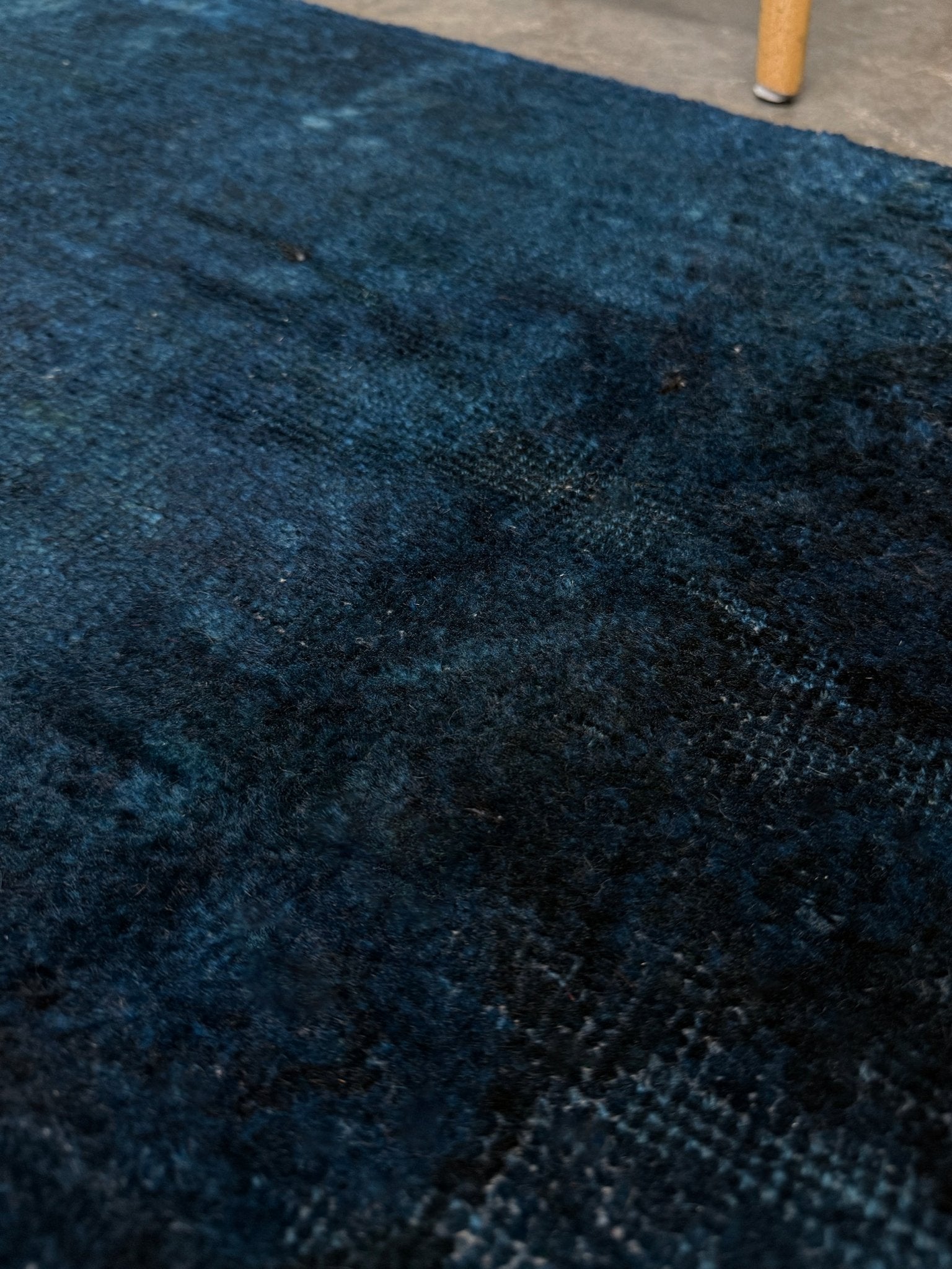 Midnight Blue Turkish overdyed Yastik rug with subtle shadowed motifs. Hand-knotted wool, 20x30 inches. Perfect for: Entryways & apartment foyers, beside the bed, kitchen sink areas, bathroom vanity spots, layered under décor pieces. One-of-a-kind rug from Indigo Rugs in Burlingame, the best rug shop in the San Francisco Bay Area. Free shipping included.