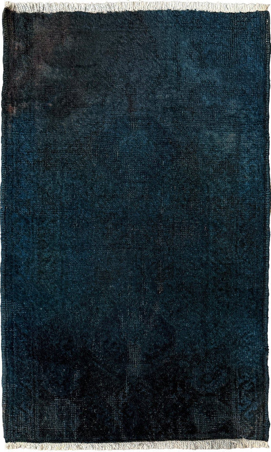 Midnight Blue Turkish overdyed Yastik rug with subtle shadowed motifs. Hand-knotted wool, 21x35 inches. Perfect for: Entryways & apartment foyers, beside the bed, kitchen sink areas, bathroom vanity spots, layered under décor pieces. One-of-a-kind rug from Indigo Rugs in Burlingame, the best rug shop in the San Francisco Bay Area. Free shipping included.